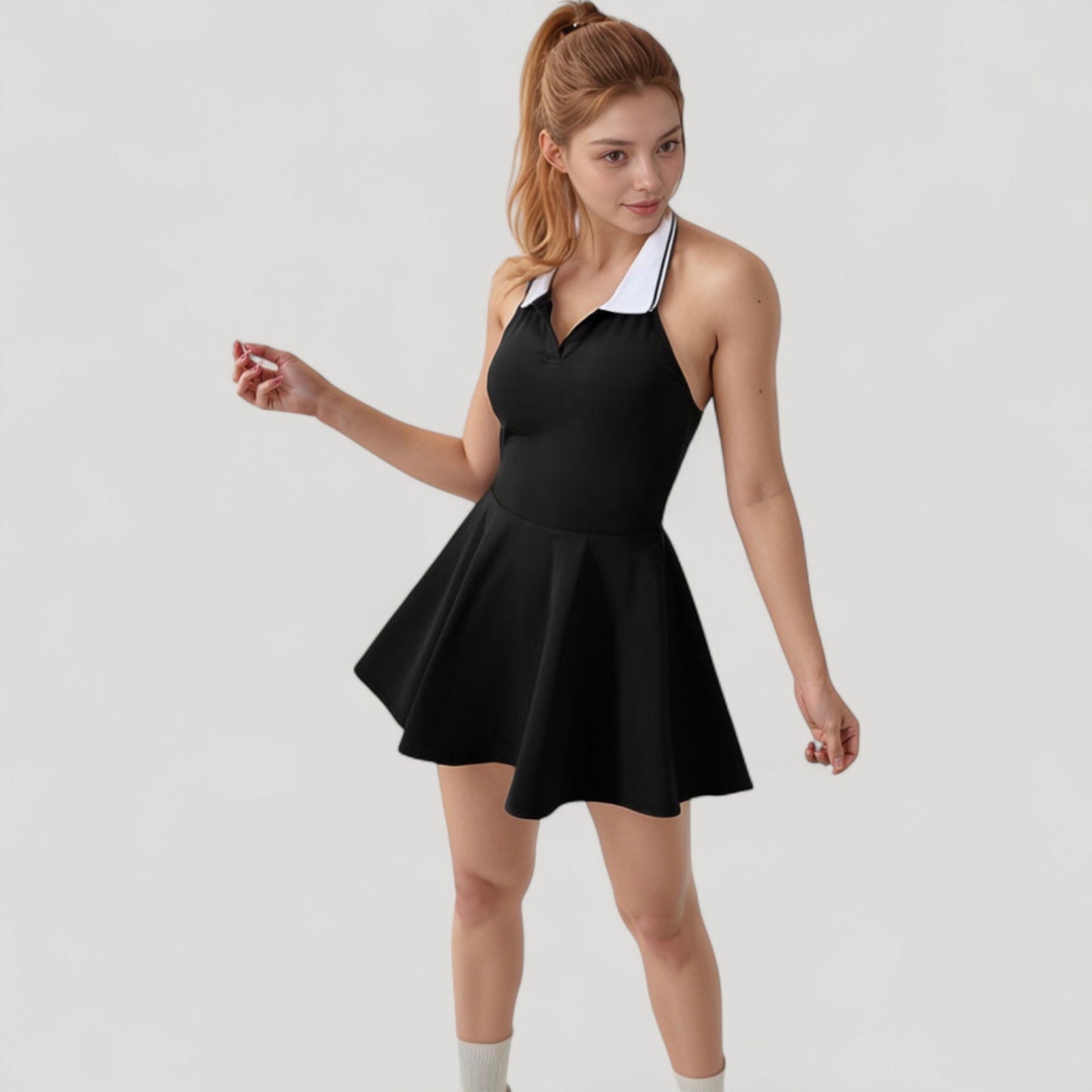 Sleeveless Tennis Dress with Contrast Polo Collar and Flared Skirt Design