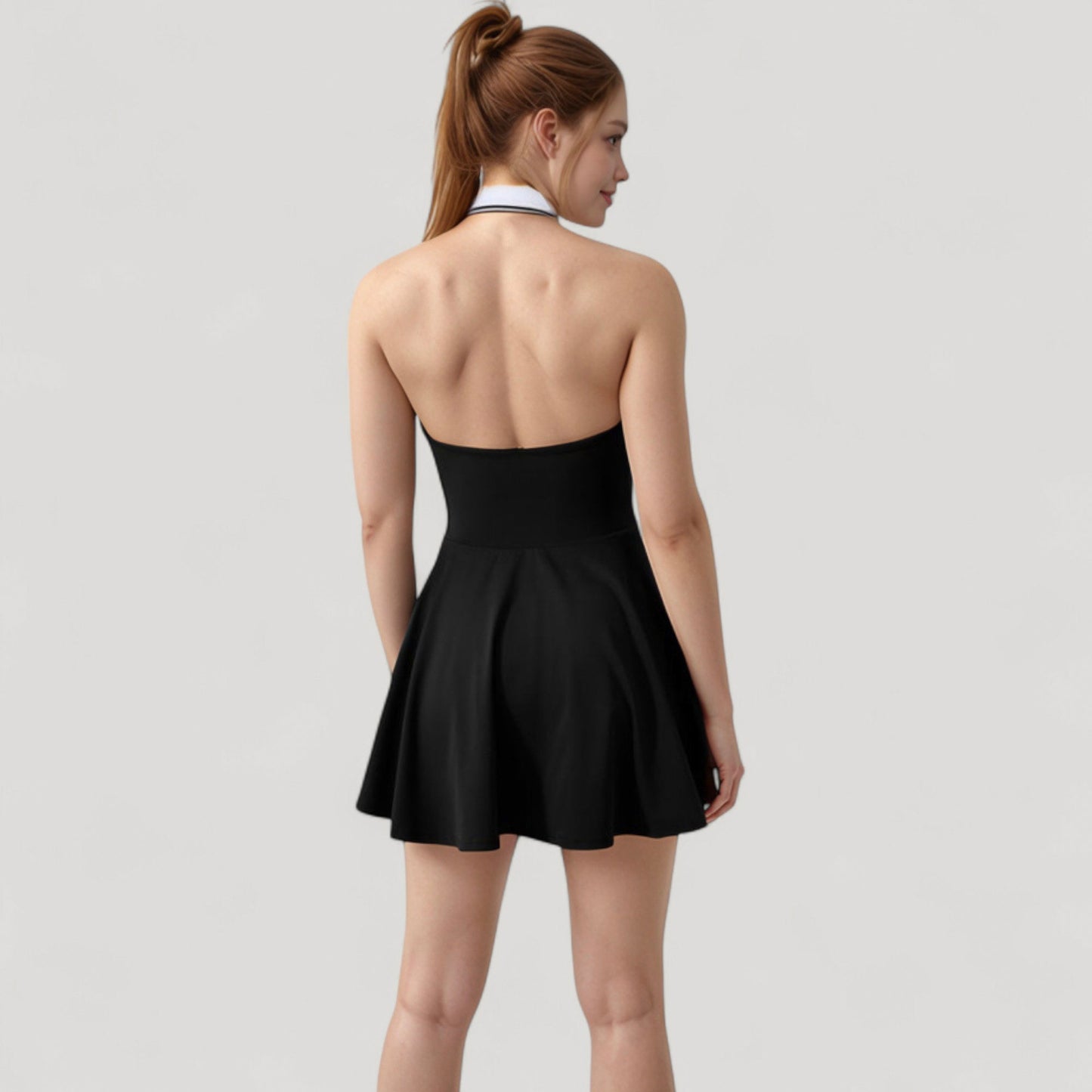 Sleeveless Tennis Dress with Contrast Polo Collar and Flared Skirt Design