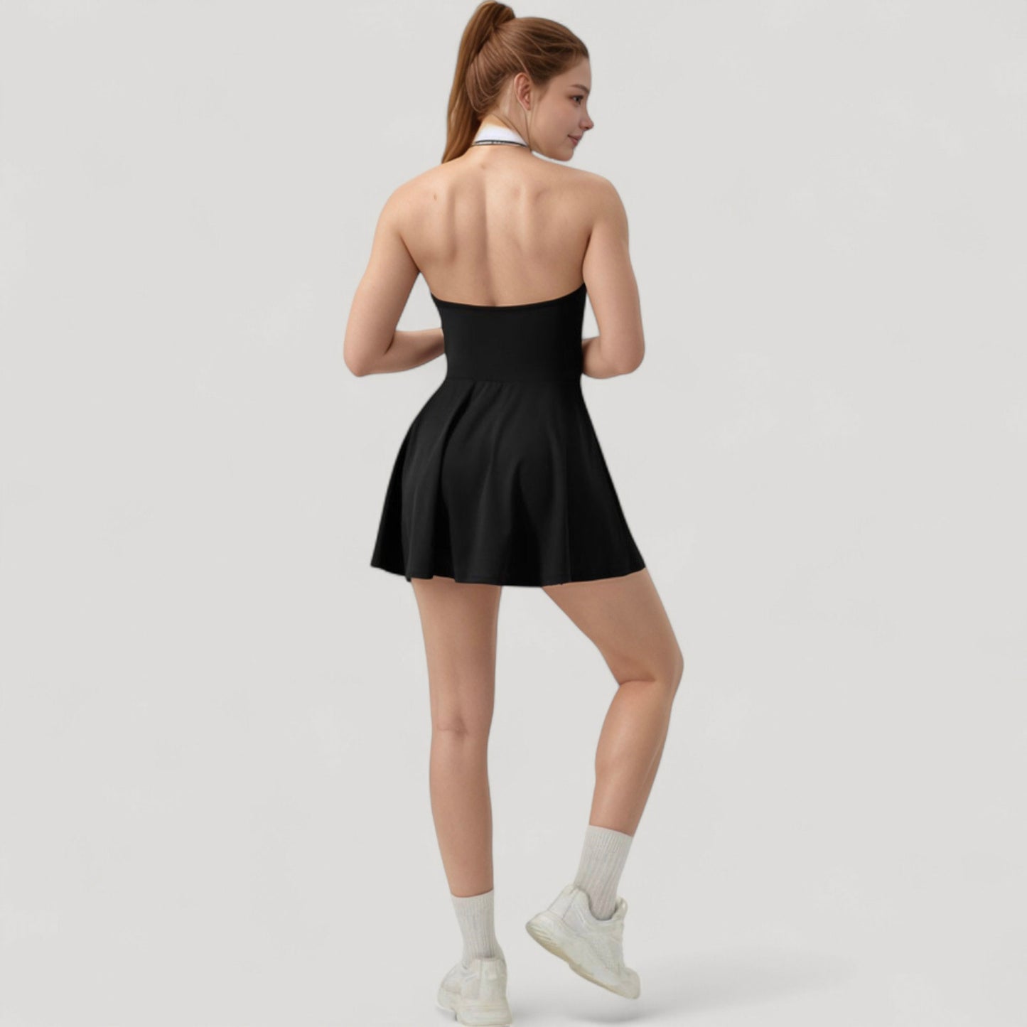 Sleeveless Tennis Dress with Contrast Polo Collar and Flared Skirt Design