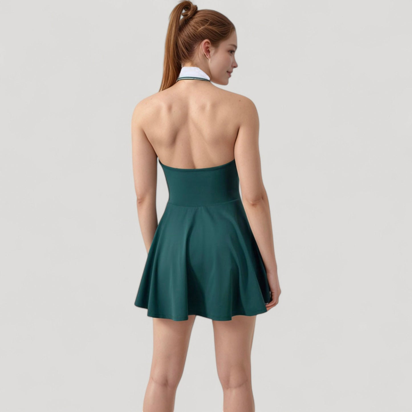 Sleeveless Tennis Dress with Contrast Polo Collar and Flared Skirt Design