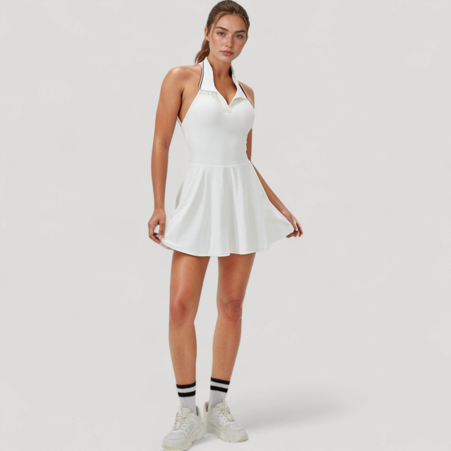 Sleeveless Tennis Dress with Contrast Polo Collar and Flared Skirt Design