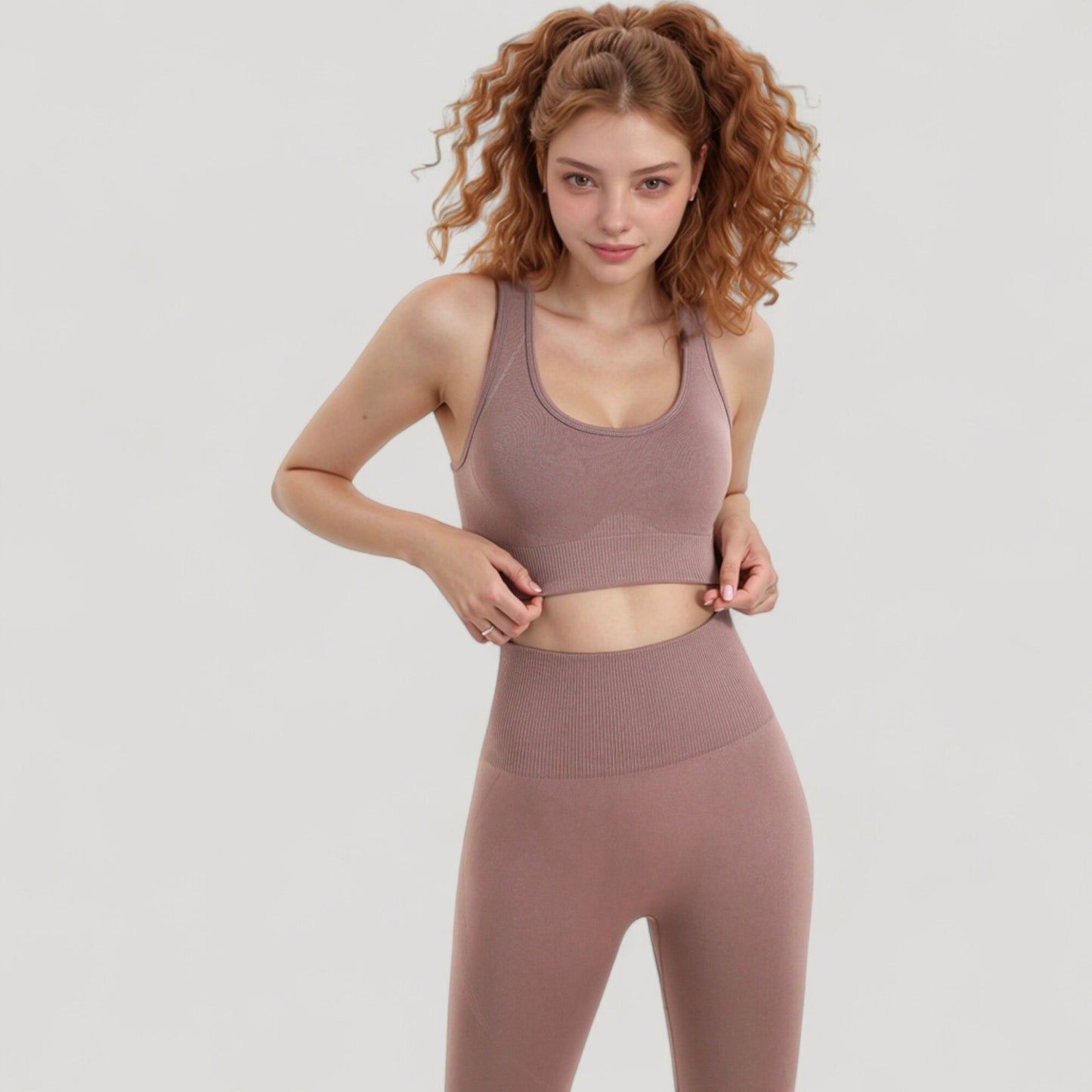 Seamless Racerback Sports Bra with Ribbed Hem and Scoop Neckline for Medium Support