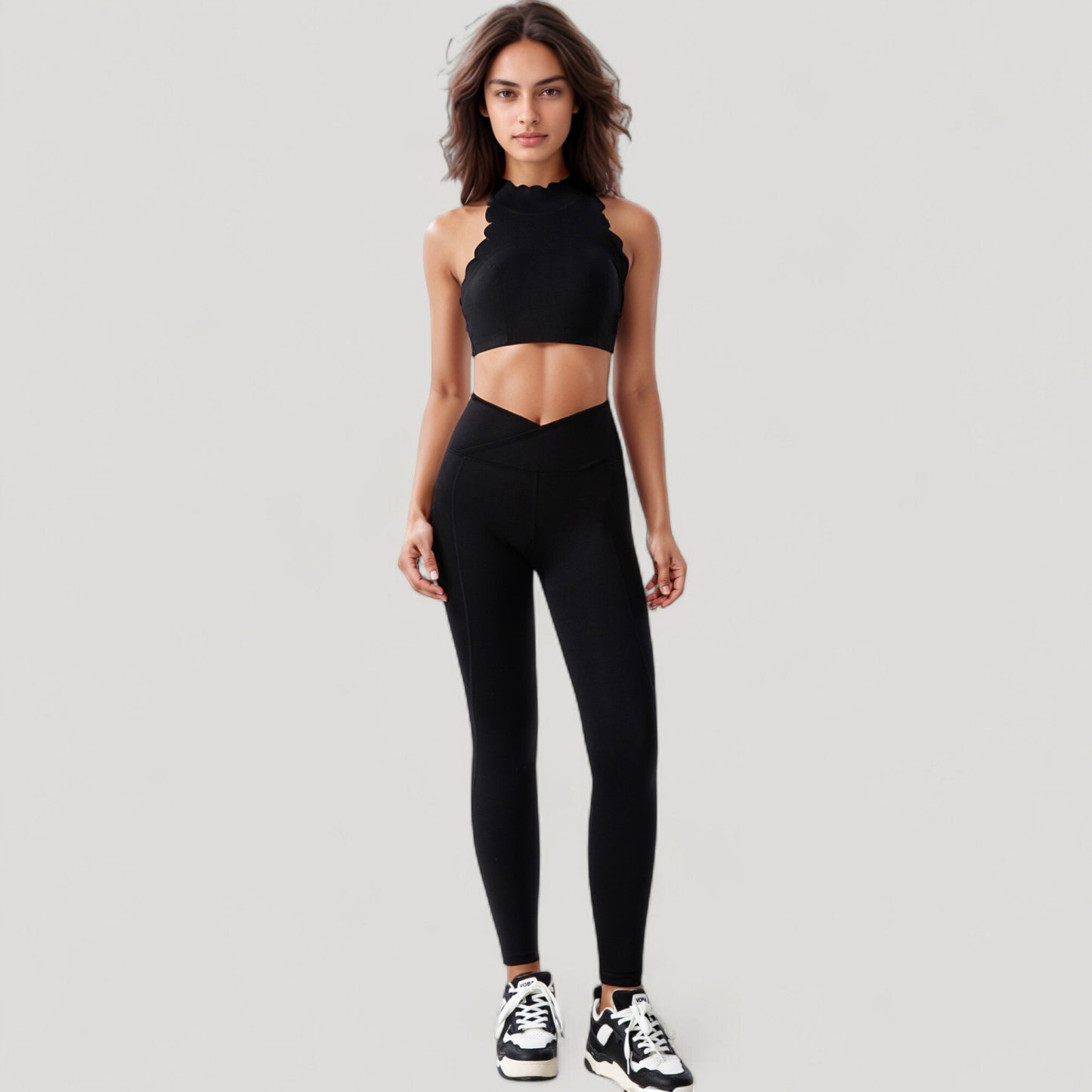 High Neck Scallop Edge Sports Bra with Sleeveless Cut and Stylish Back Detailing for Light Activity