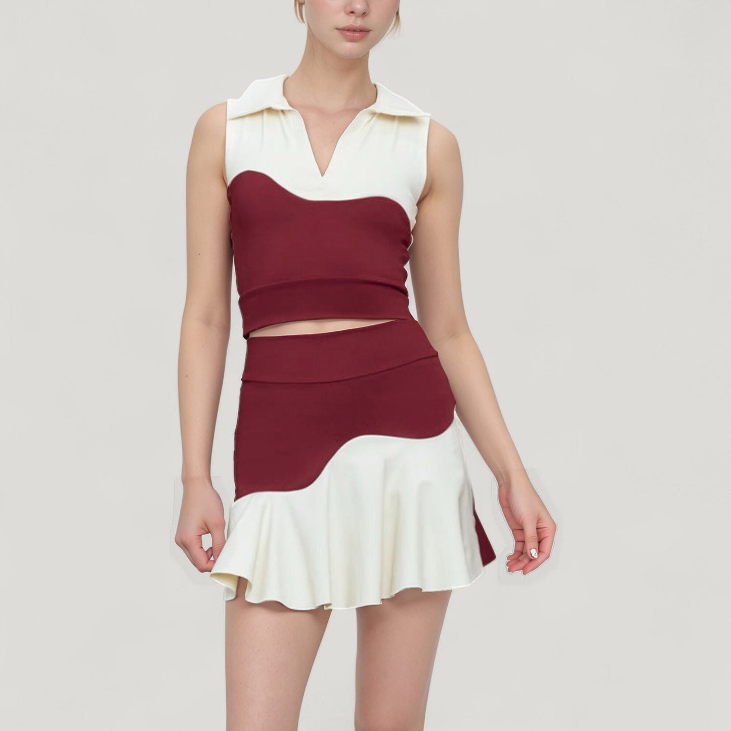 Sleeveless Colorblock Cropped Top with Collared Neckline and Sculpted Contrast Design