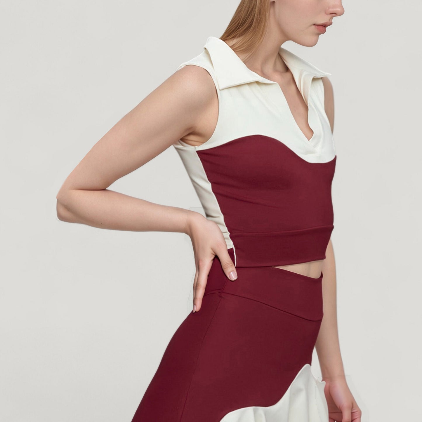 Sleeveless Colorblock Cropped Top with Collared Neckline and Sculpted Contrast Design