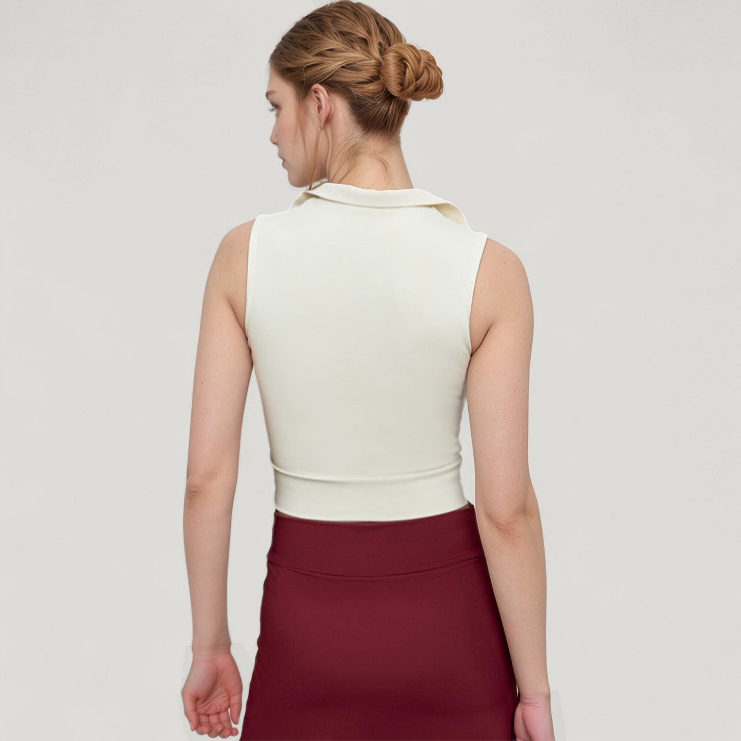 Sleeveless Colorblock Cropped Top with Collared Neckline and Sculpted Contrast Design