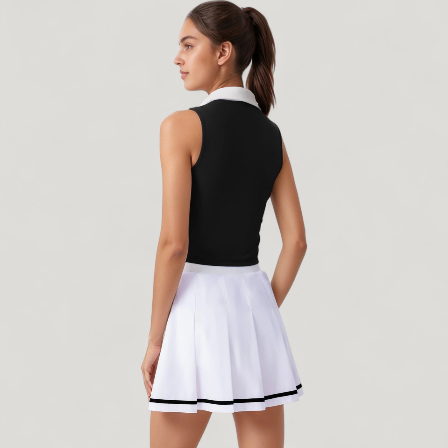 Two-Piece Tennis Set with Sleeveless Polo Crop Top and Pleated High Waist Skirt