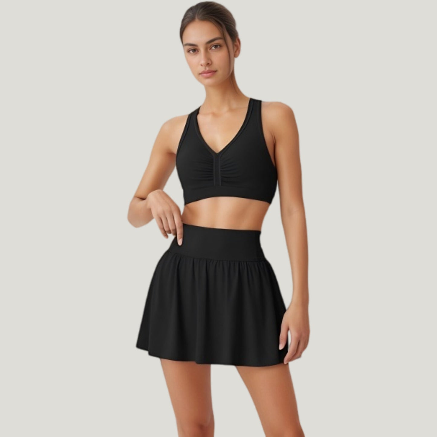 Two-Piece Activewear Set with V-Neck Ruched Sports Bra and High Waist Flare Skirt
