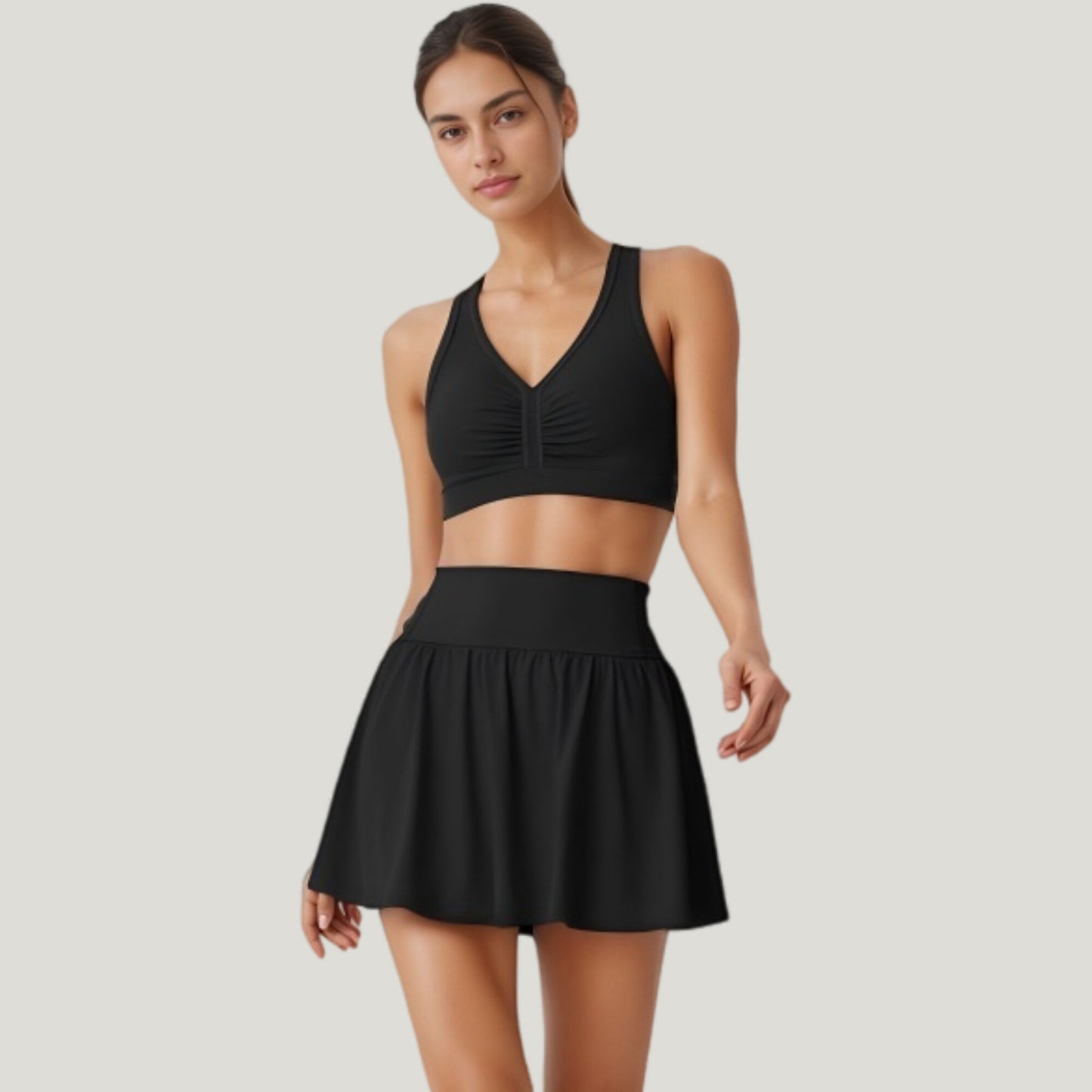 Two-Piece Activewear Set with V-Neck Ruched Sports Bra and High Waist Flare Skirt