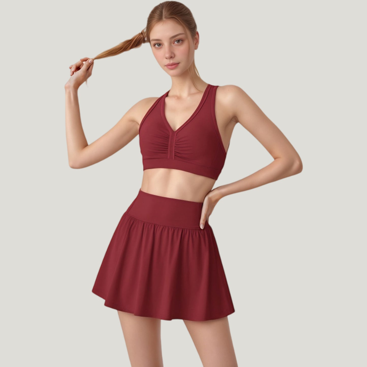 Two-Piece Activewear Set with V-Neck Ruched Sports Bra and High Waist Flare Skirt
