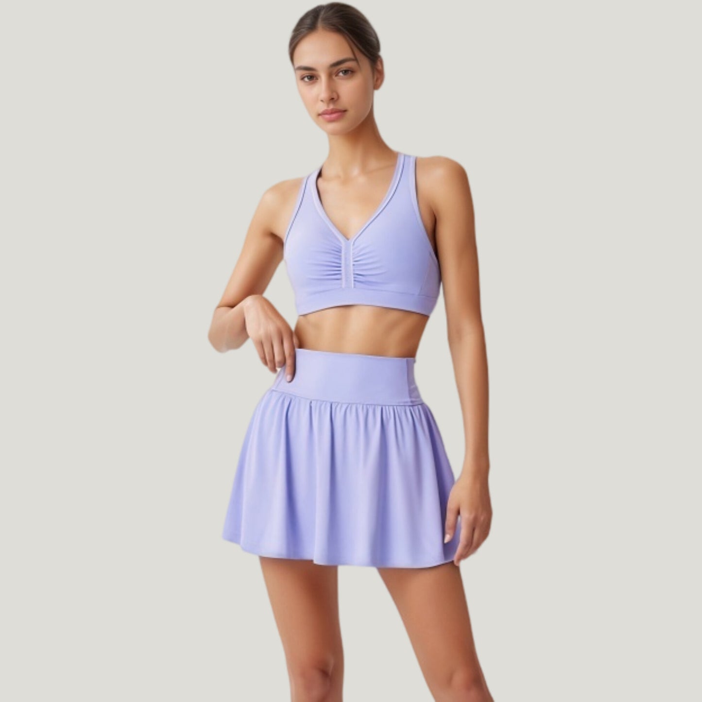 Two-Piece Activewear Set with V-Neck Ruched Sports Bra and High Waist Flare Skirt