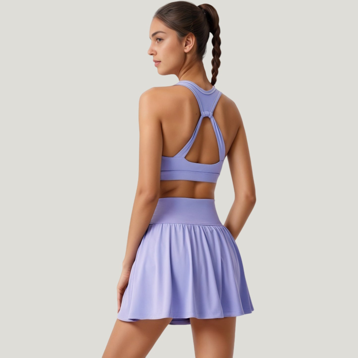 Two-Piece Activewear Set with V-Neck Ruched Sports Bra and High Waist Flare Skirt