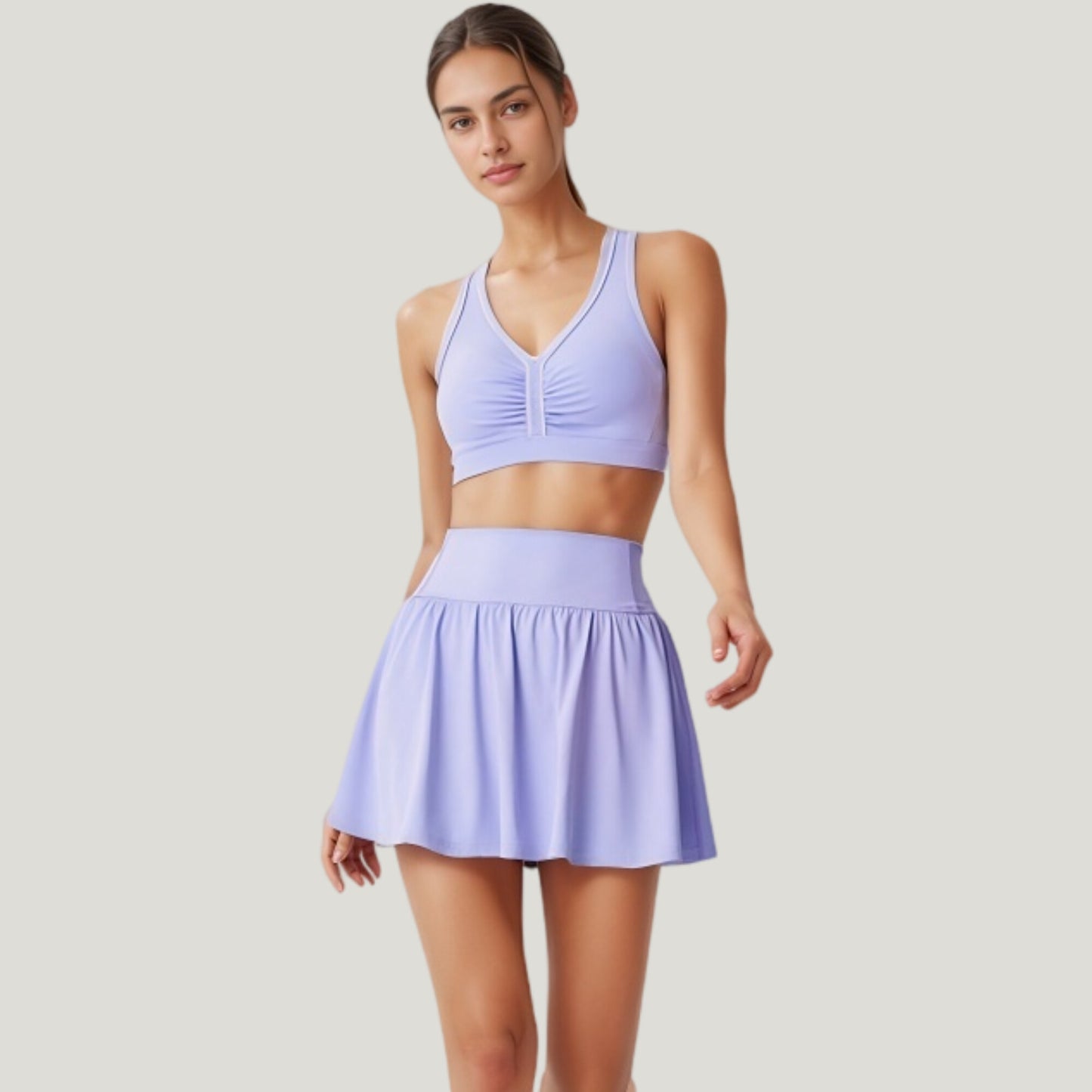 Two-Piece Activewear Set with V-Neck Ruched Sports Bra and High Waist Flare Skirt