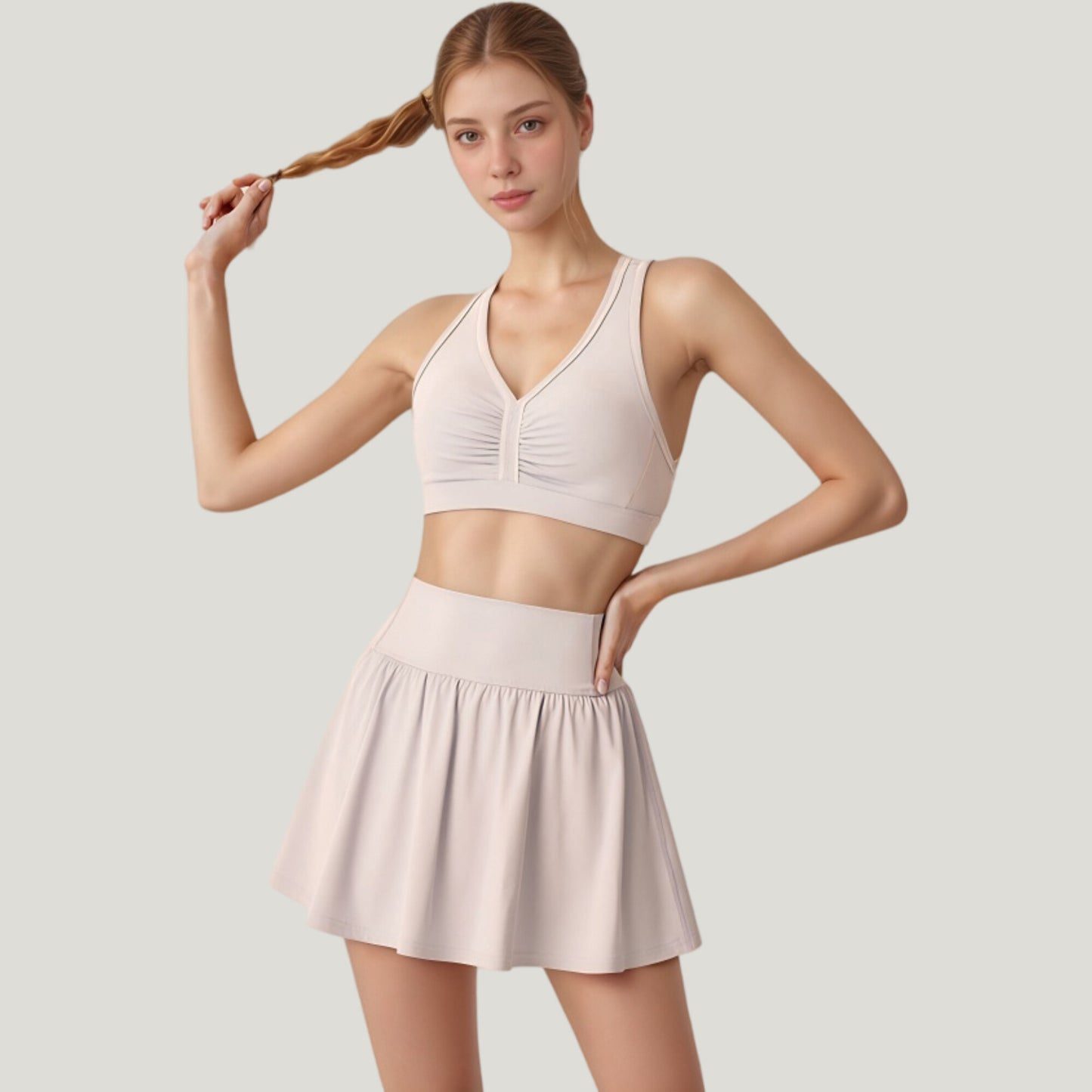 Two-Piece Activewear Set with V-Neck Ruched Sports Bra and High Waist Flare Skirt