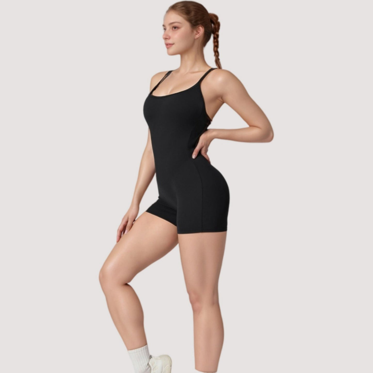 Strappy Activewear Romper with Fitted Bodice and Stretch Fabric for Flexible Movement