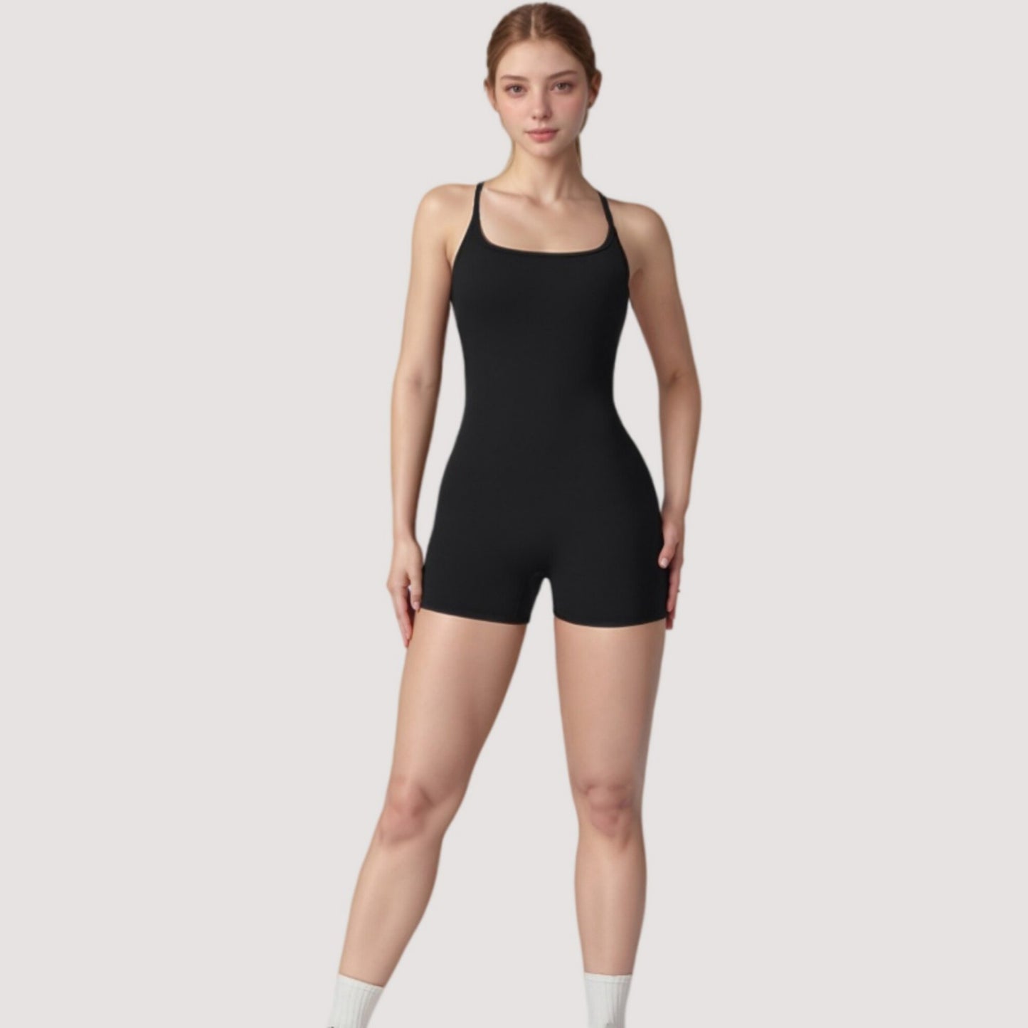 Strappy Activewear Romper with Fitted Bodice and Stretch Fabric for Flexible Movement
