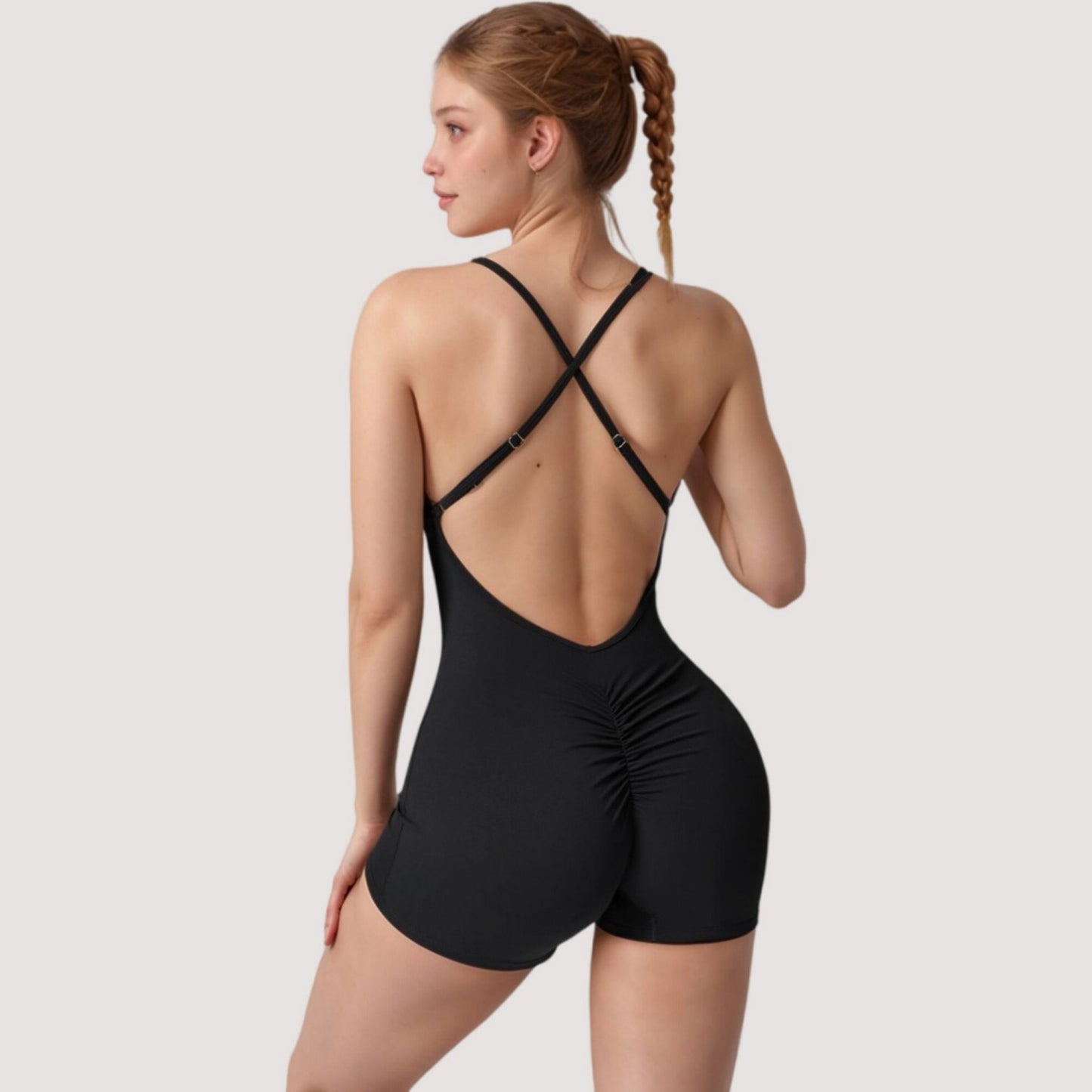 Strappy Activewear Romper with Fitted Bodice and Stretch Fabric for Flexible Movement