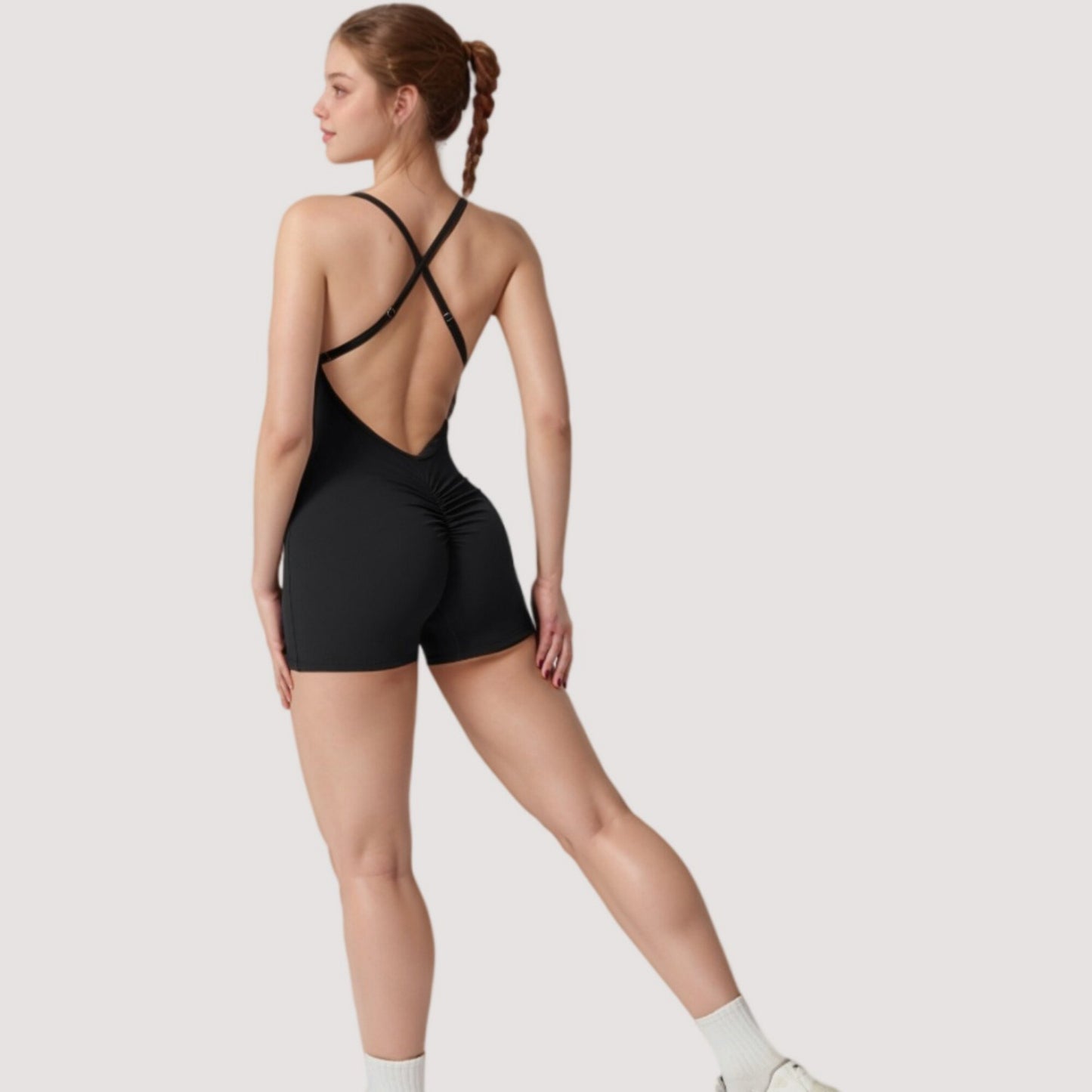 Strappy Activewear Romper with Fitted Bodice and Stretch Fabric for Flexible Movement