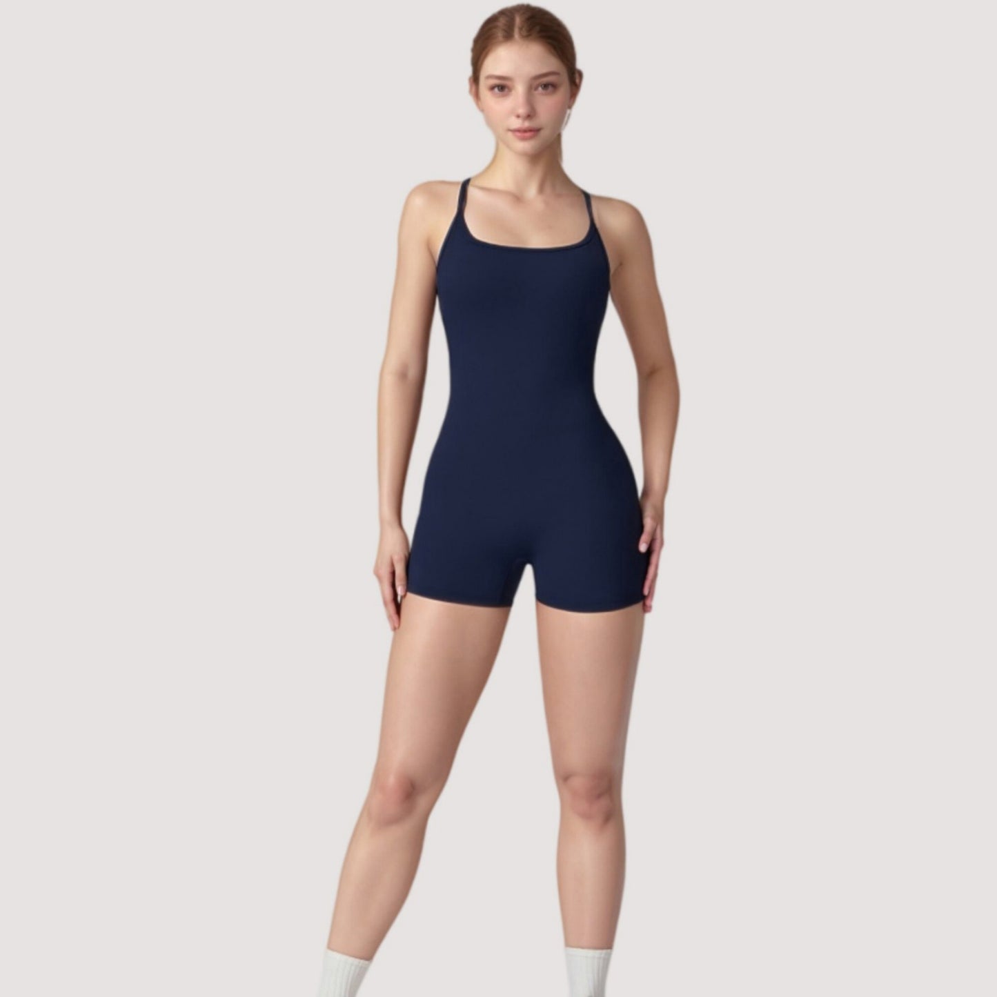 Strappy Activewear Romper with Fitted Bodice and Stretch Fabric for Flexible Movement