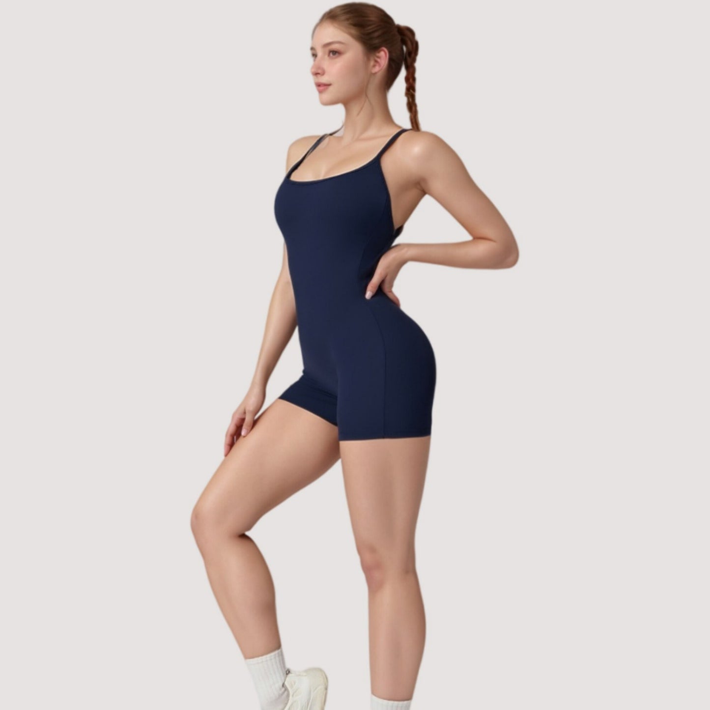 Strappy Activewear Romper with Fitted Bodice and Stretch Fabric for Flexible Movement