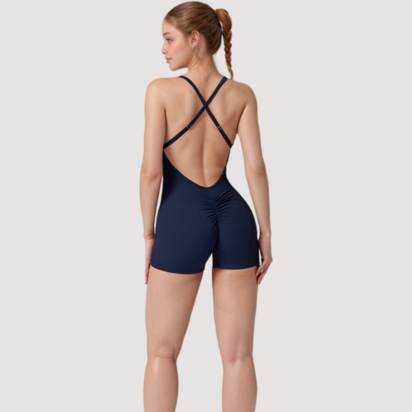 Strappy Activewear Romper with Fitted Bodice and Stretch Fabric for Flexible Movement