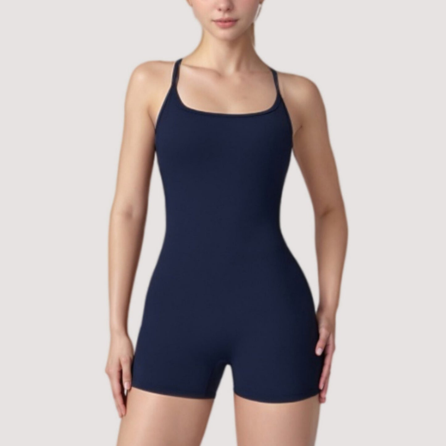 Strappy Activewear Romper with Fitted Bodice and Stretch Fabric for Flexible Movement