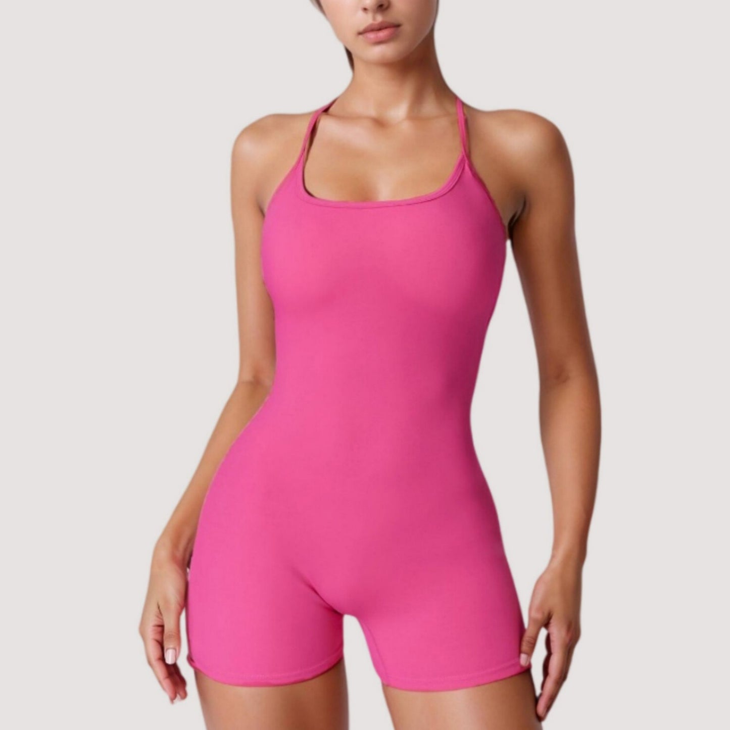 Strappy Activewear Romper with Fitted Bodice and Stretch Fabric for Flexible Movement