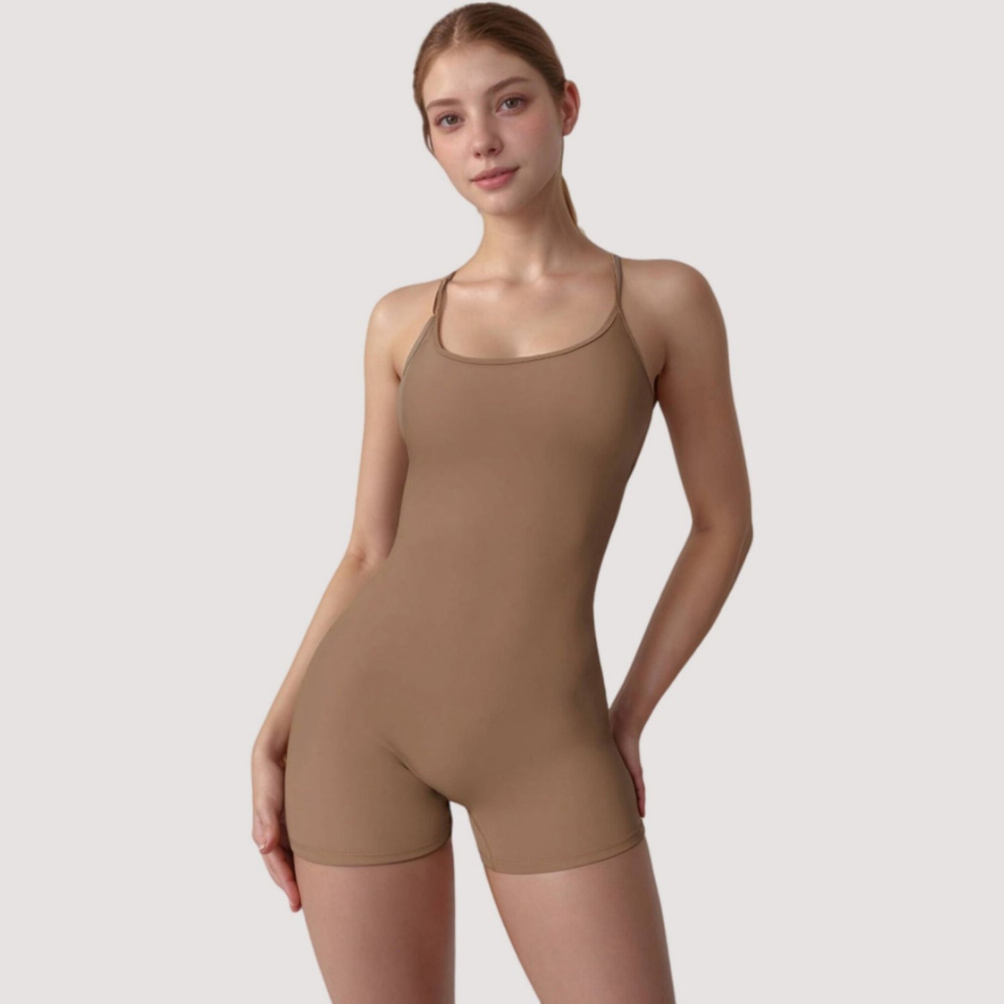Strappy Activewear Romper with Fitted Bodice and Stretch Fabric for Flexible Movement
