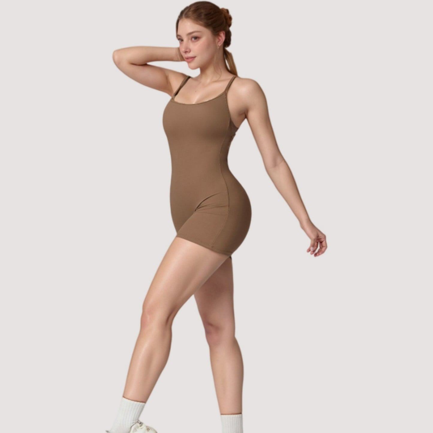 Strappy Activewear Romper with Fitted Bodice and Stretch Fabric for Flexible Movement
