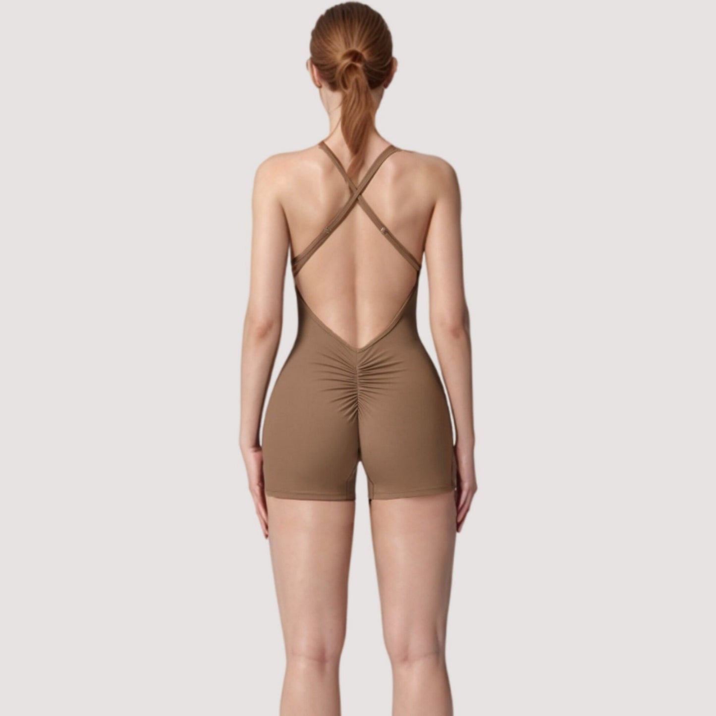 Strappy Activewear Romper with Fitted Bodice and Stretch Fabric for Flexible Movement