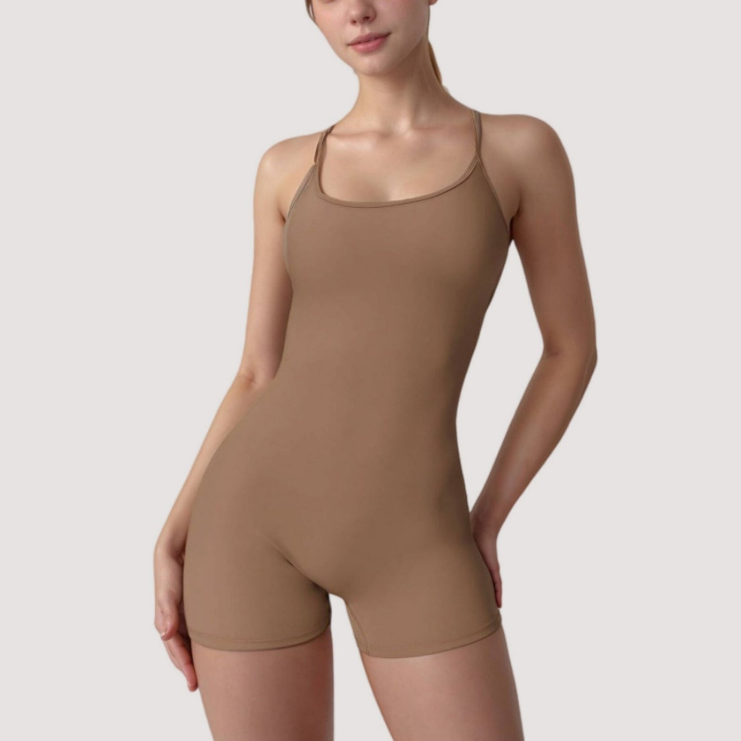 Strappy Activewear Romper with Fitted Bodice and Stretch Fabric for Flexible Movement