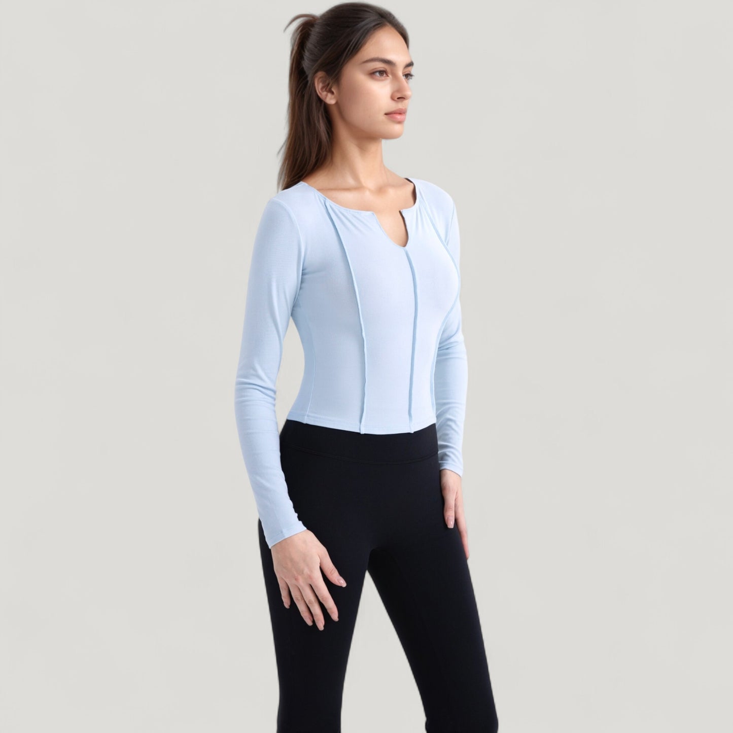 Long Sleeve Fitted Athletic Top with Notch Neckline and Contoured Seams