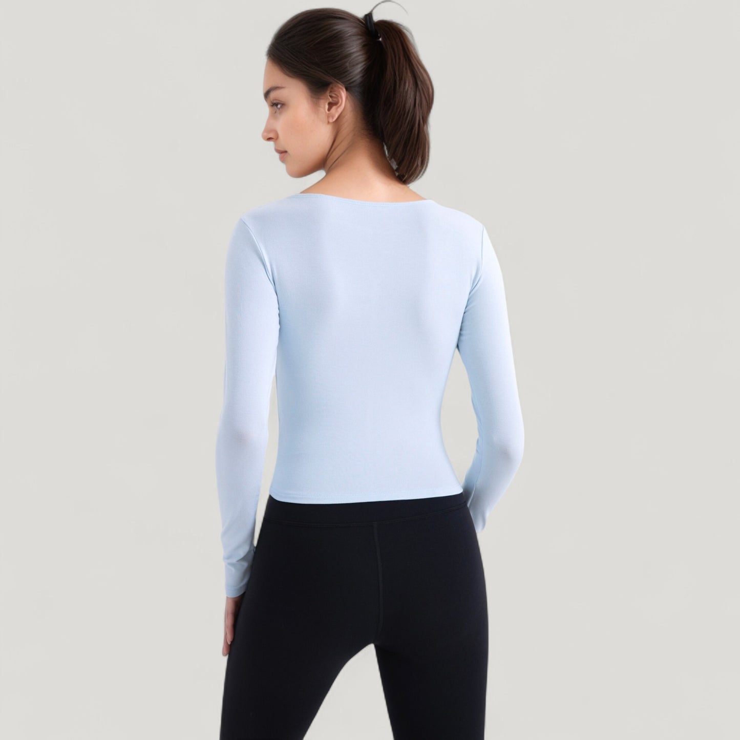 Long Sleeve Fitted Athletic Top with Notch Neckline and Contoured Seams