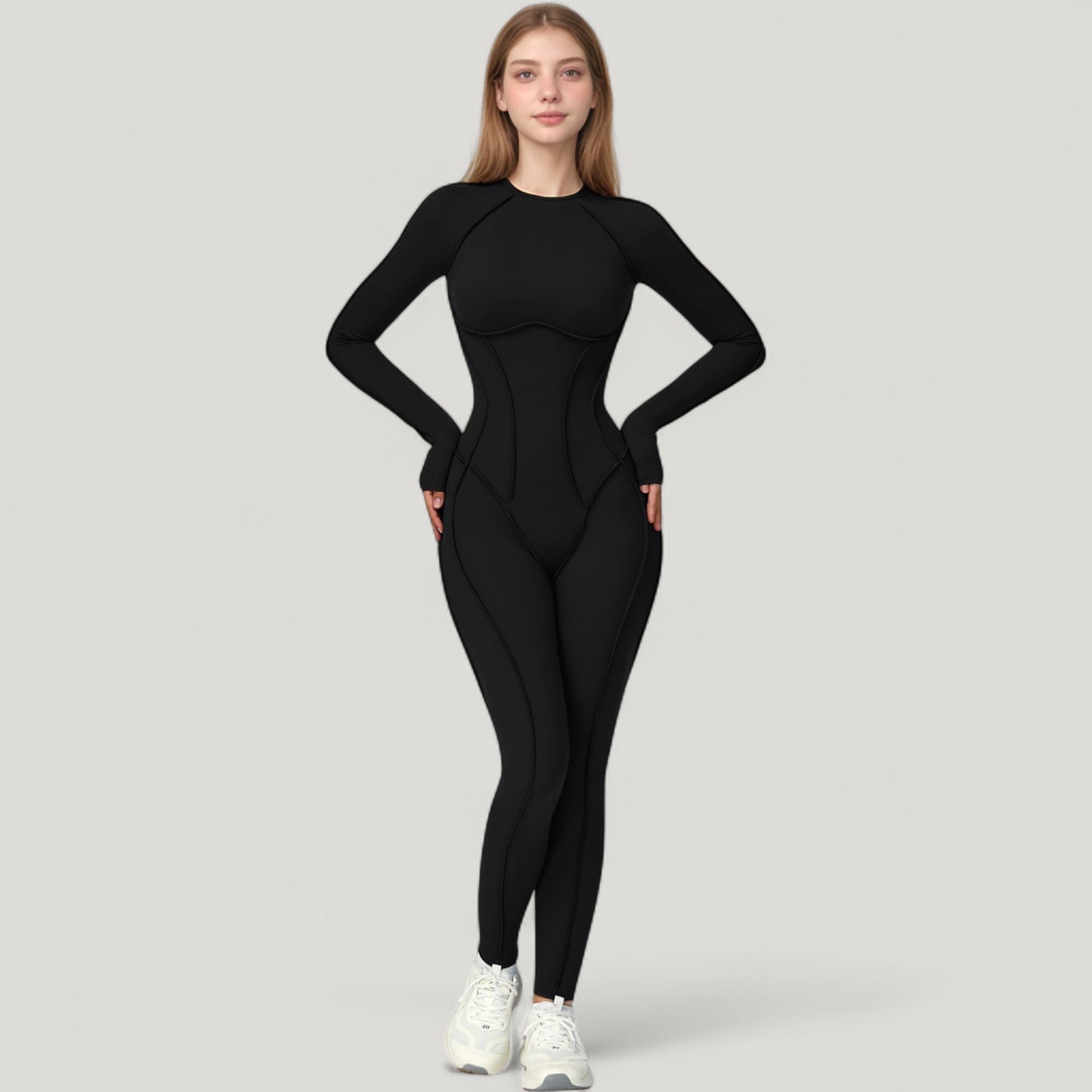 Long Sleeve Fitted One-Piece Activewear Jumpsuit with Contoured Stitching and Open Back Design