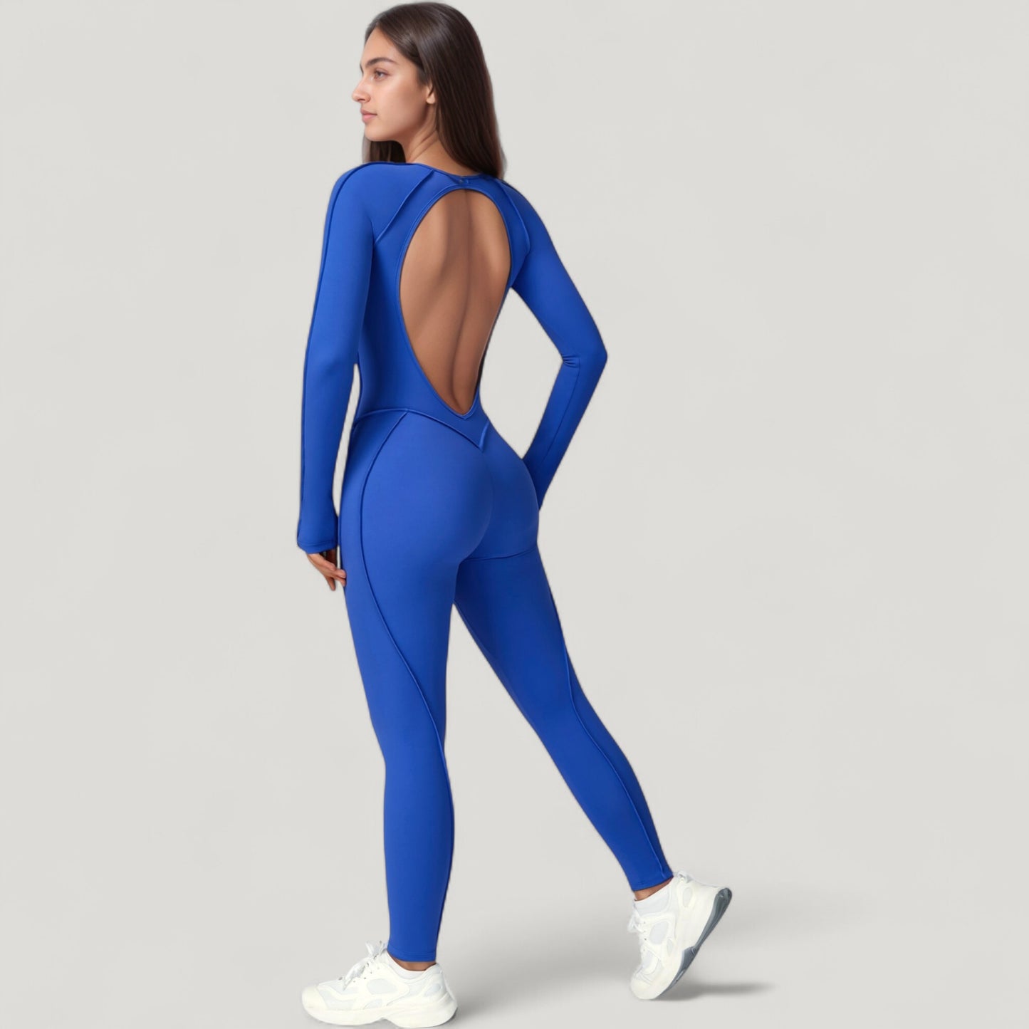 Long Sleeve Fitted One-Piece Activewear Jumpsuit with Contoured Stitching and Open Back Design