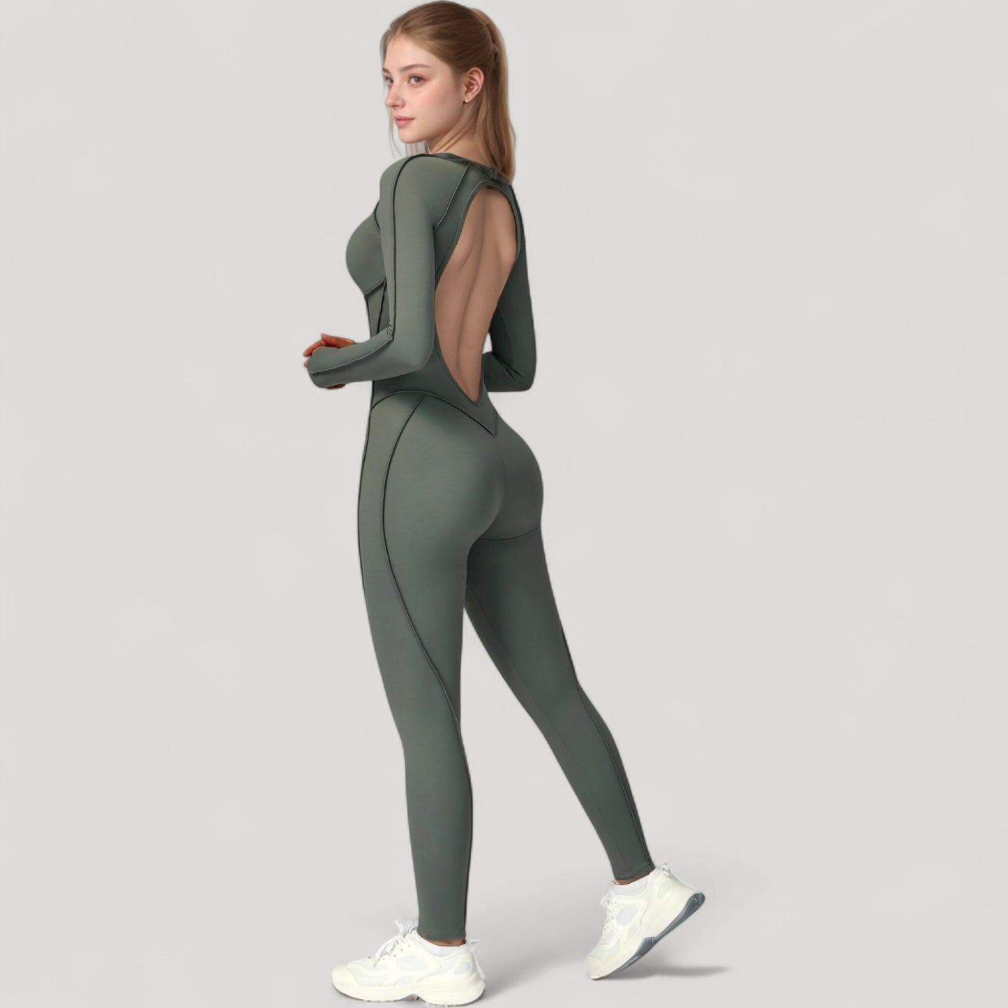 Long Sleeve Fitted One-Piece Activewear Jumpsuit with Contoured Stitching and Open Back Design