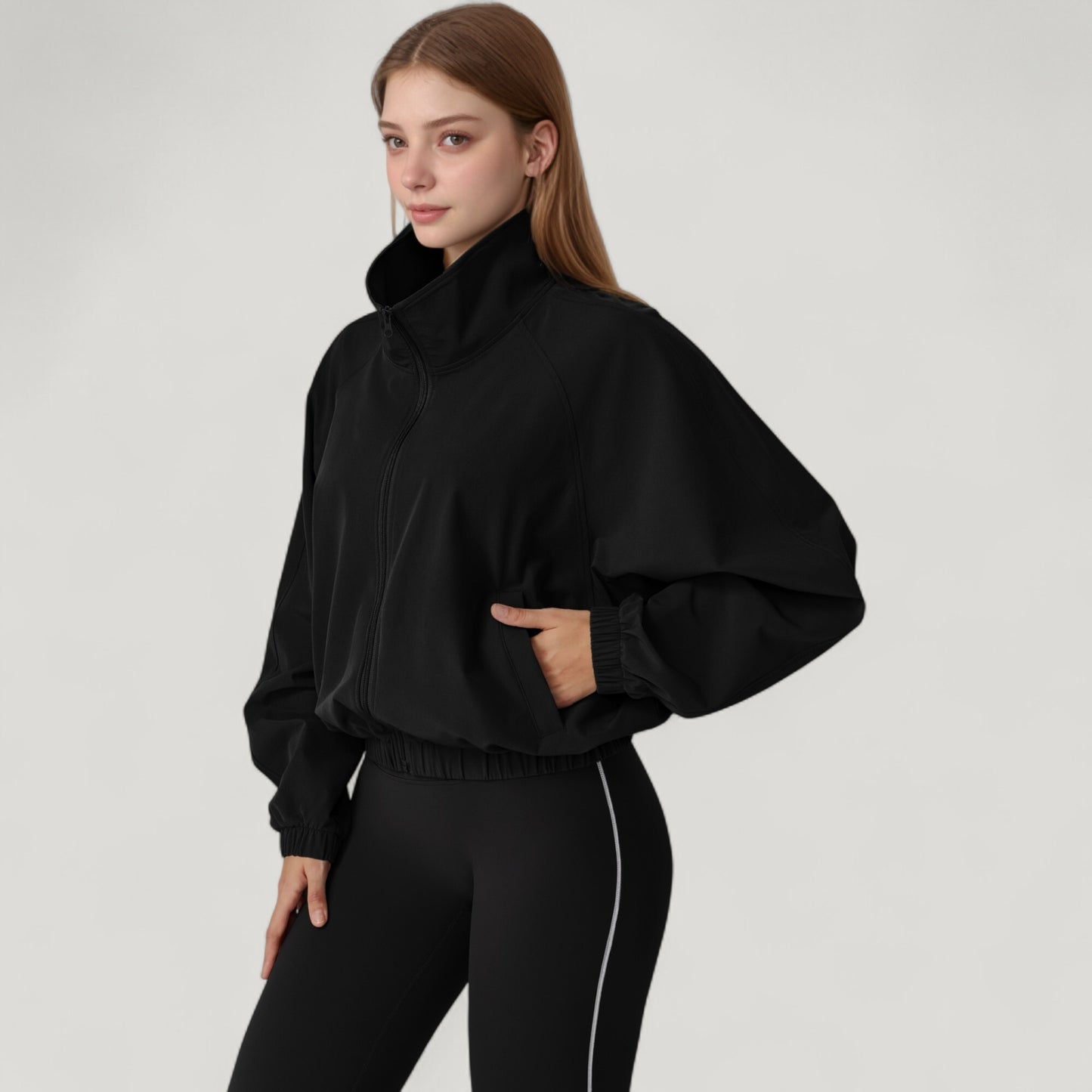 Zip-Up Activewear Jacket with High Collar Long Sleeves and Relaxed Elastic Hem