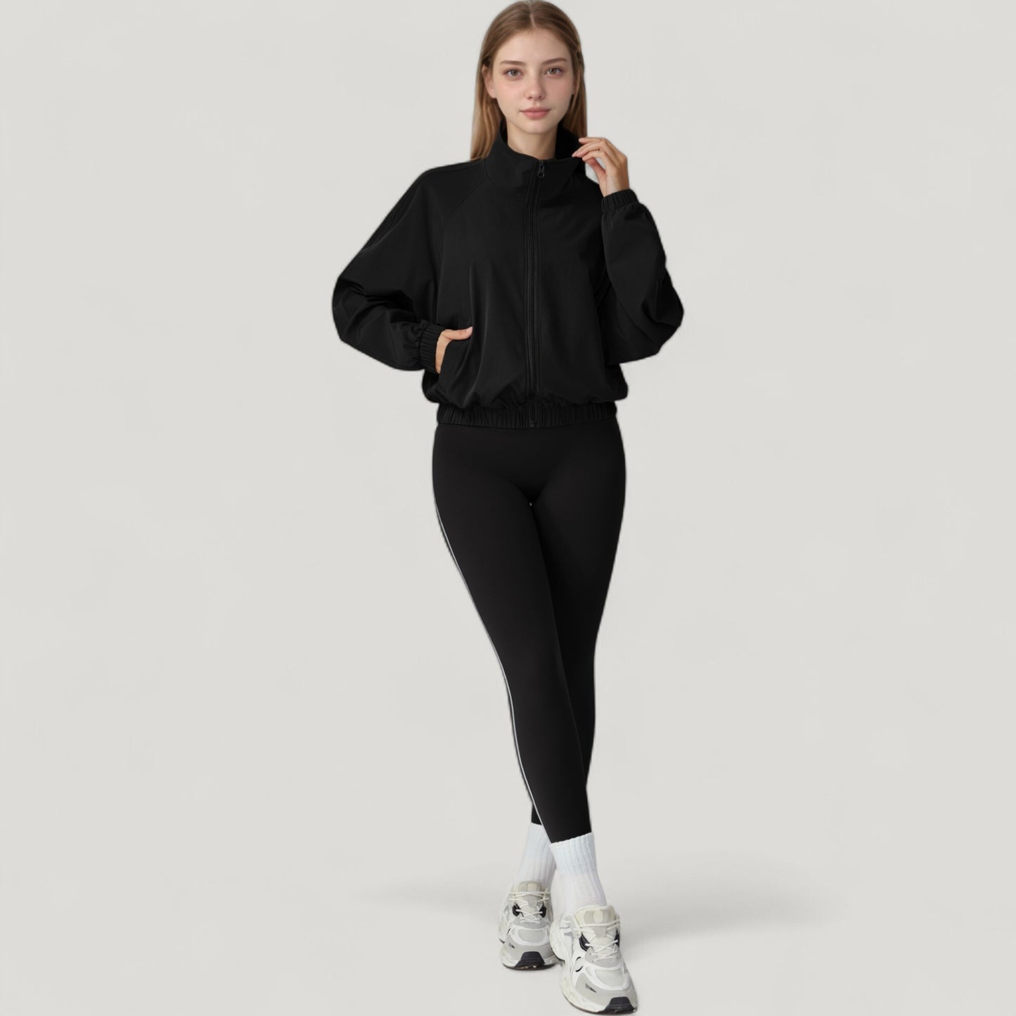 Zip-Up Activewear Jacket with High Collar Long Sleeves and Relaxed Elastic Hem