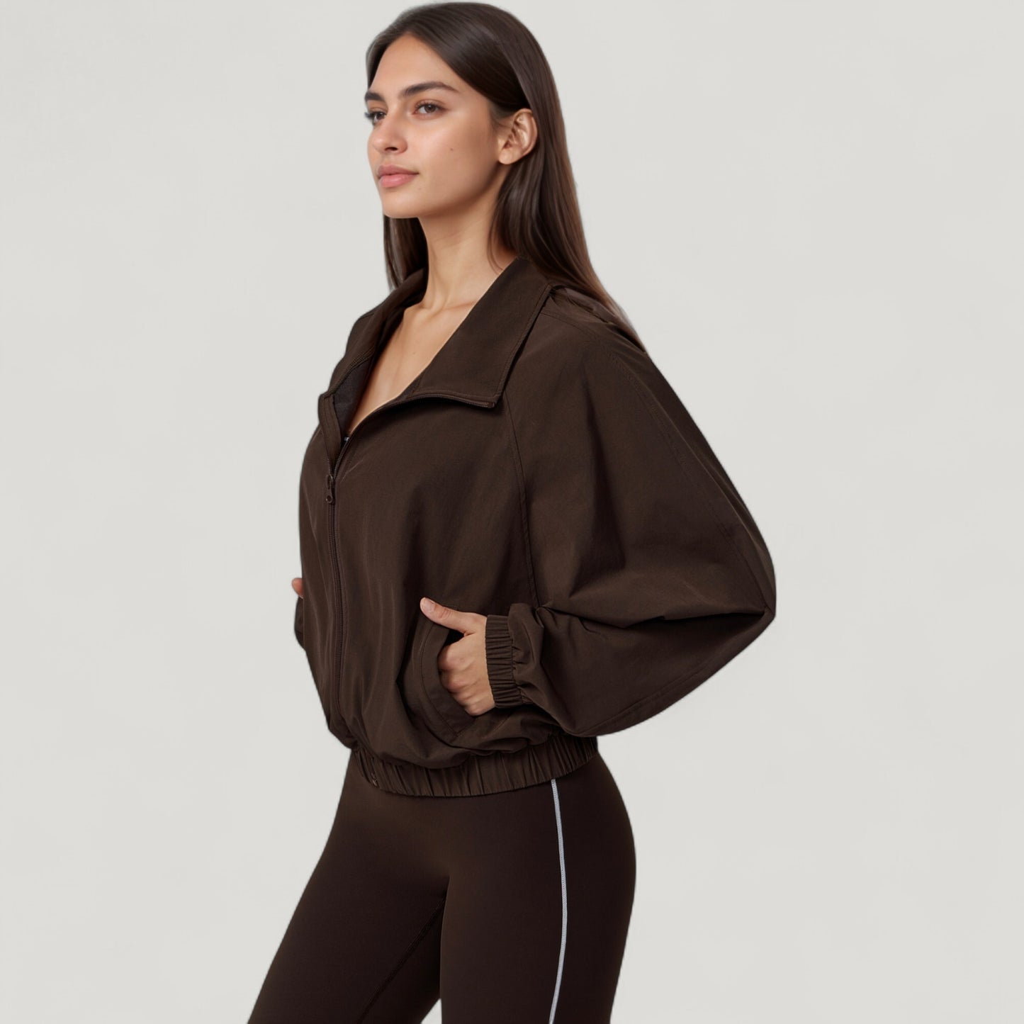 Zip-Up Activewear Jacket with High Collar Long Sleeves and Relaxed Elastic Hem