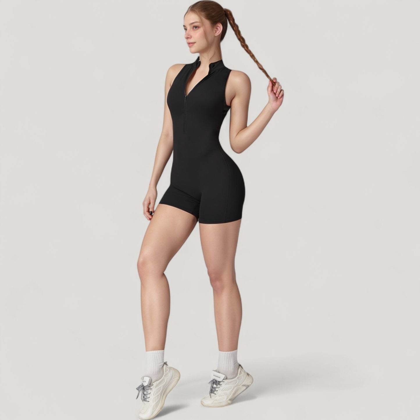Sleeveless Zip Front Activewear Romper with Open Back and Contoured Fit
