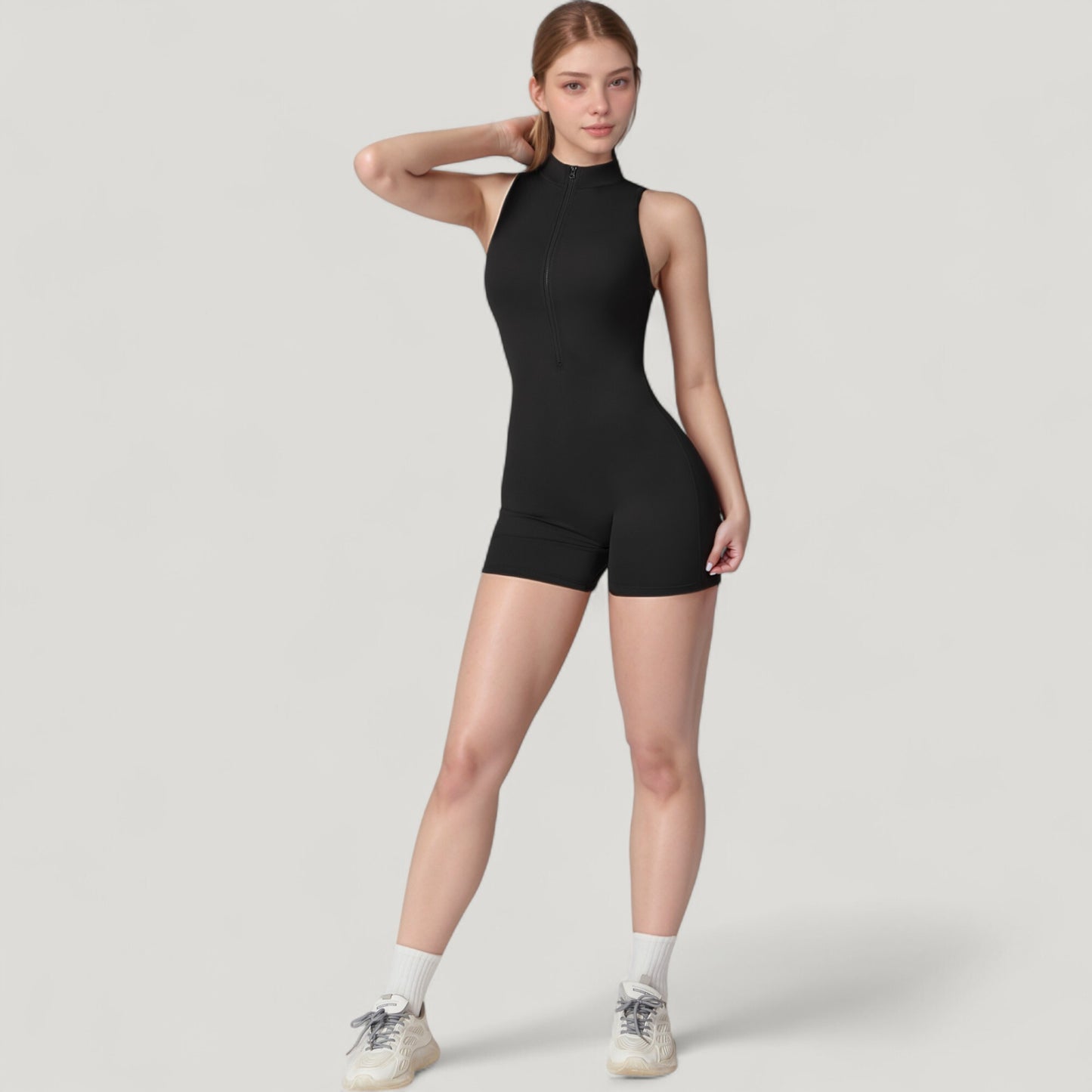 Sleeveless Zip Front Activewear Romper with Open Back and Contoured Fit