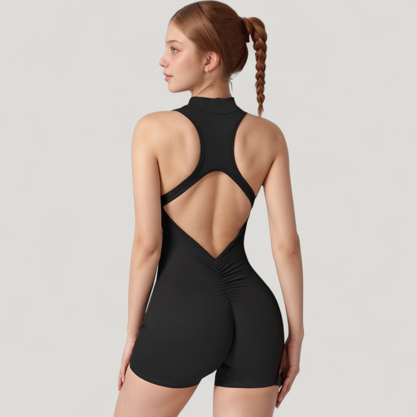 Sleeveless Zip Front Activewear Romper with Open Back and Contoured Fit