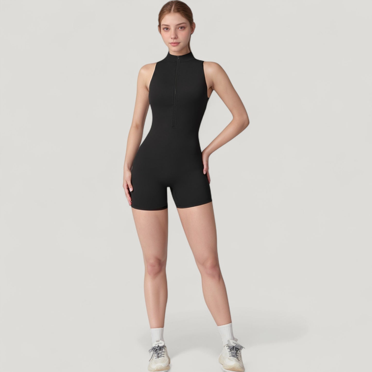 Sleeveless Zip Front Activewear Romper with Open Back and Contoured Fit