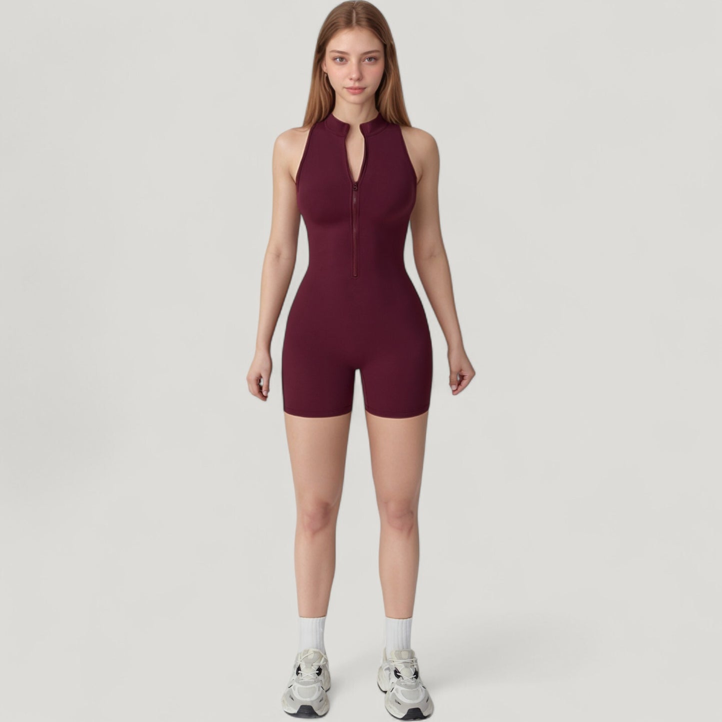 Sleeveless Zip Front Activewear Romper with Open Back and Contoured Fit