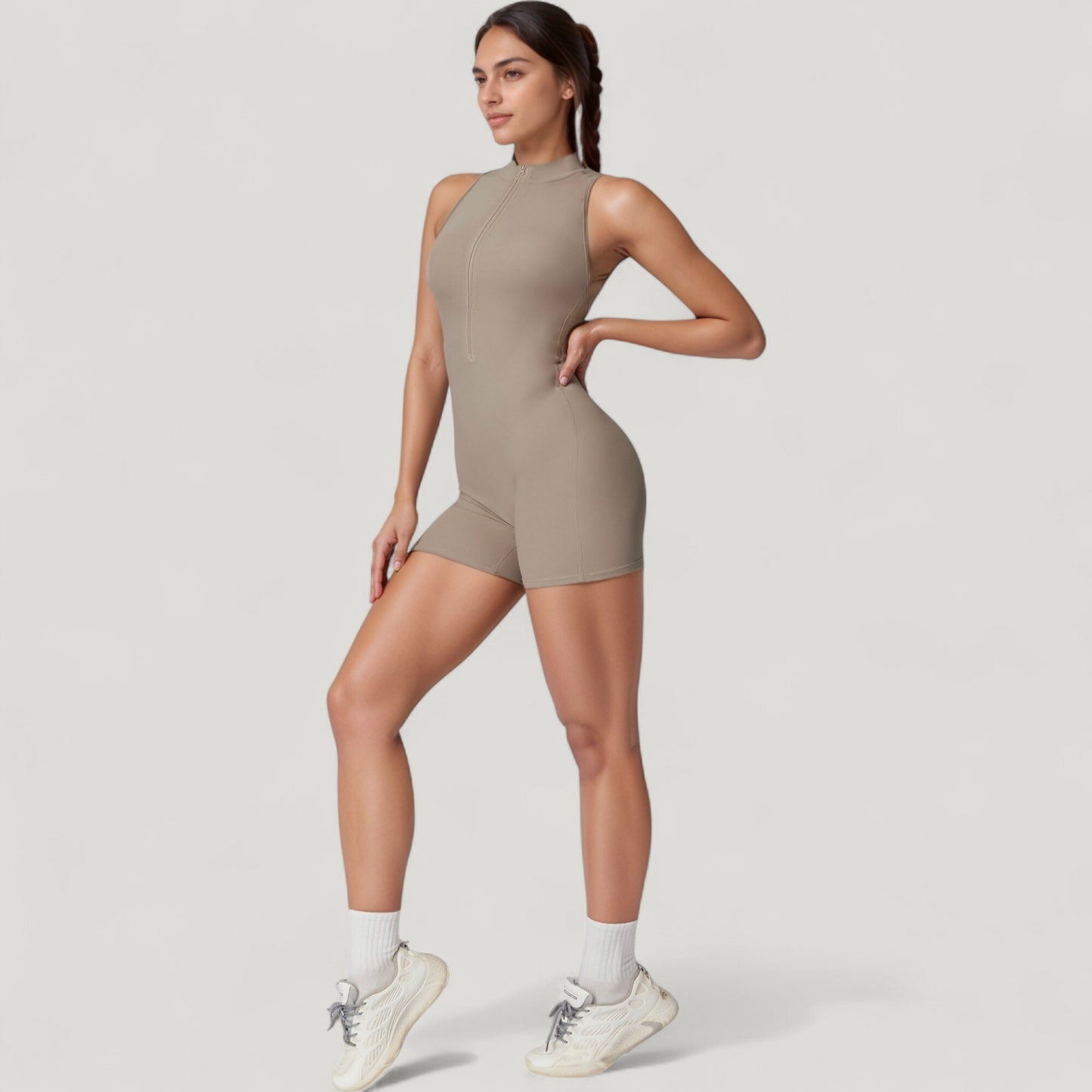 Sleeveless Zip Front Activewear Romper with Open Back and Contoured Fit