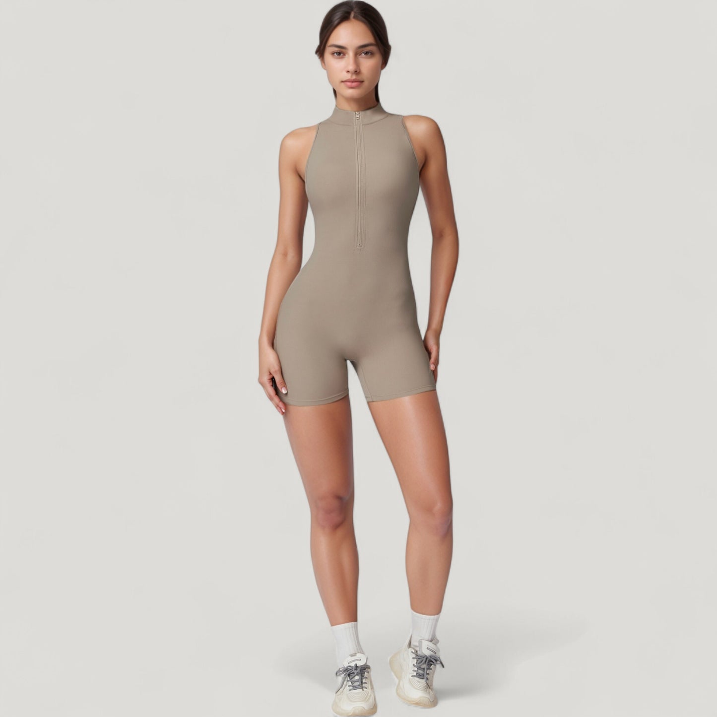 Sleeveless Zip Front Activewear Romper with Open Back and Contoured Fit