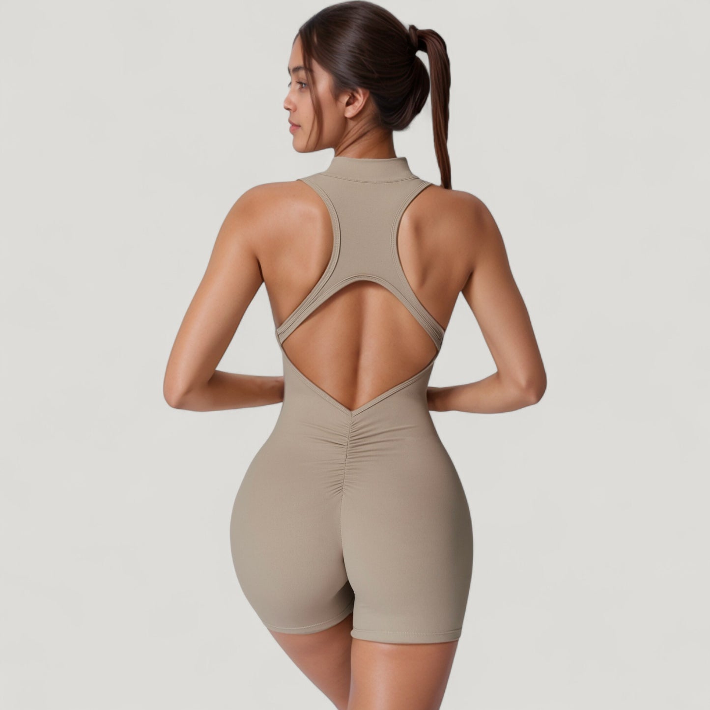 Sleeveless Zip Front Activewear Romper with Open Back and Contoured Fit