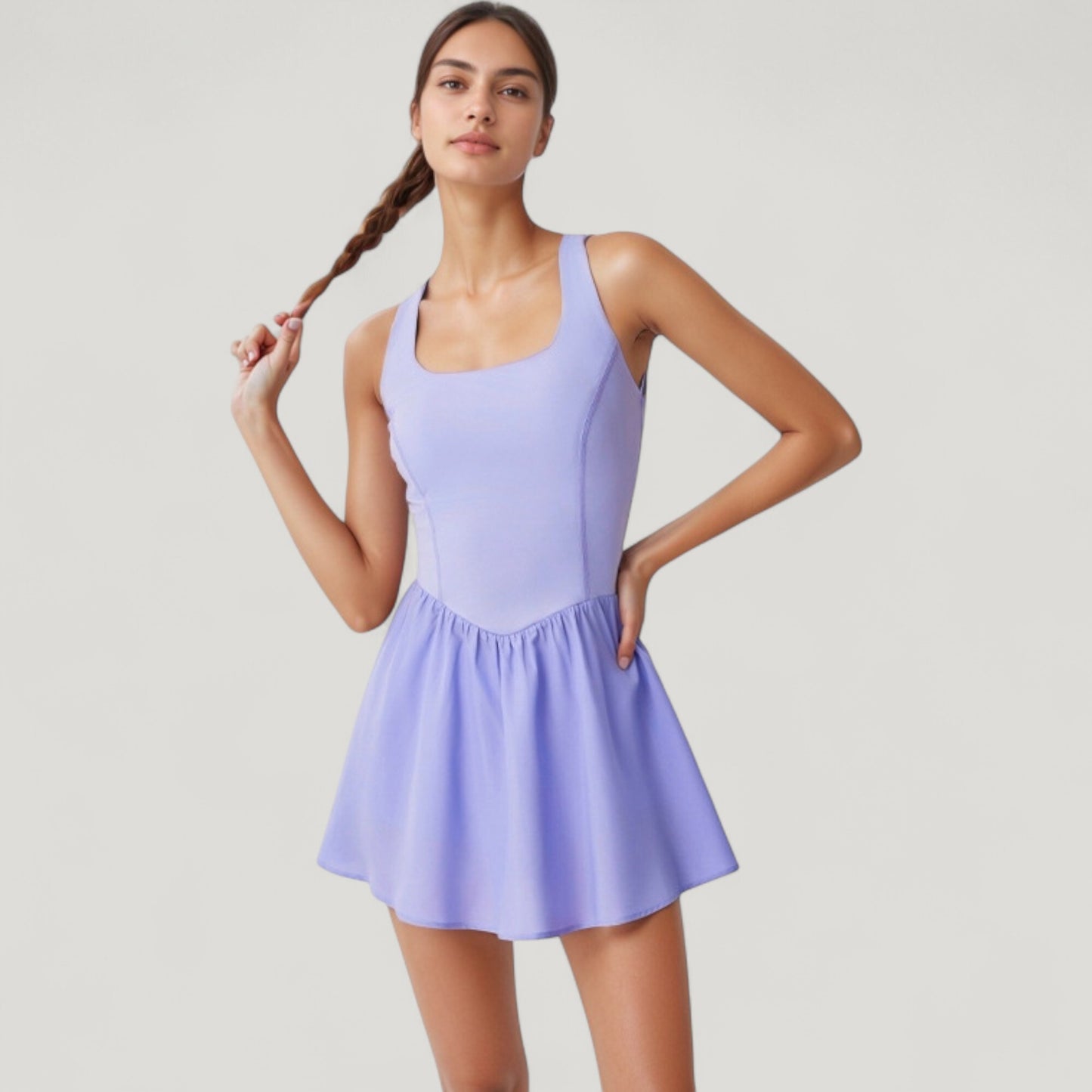 Sleeveless Active Tennis Dress with Flowy Skirt and Crisscross Back Strap Detail