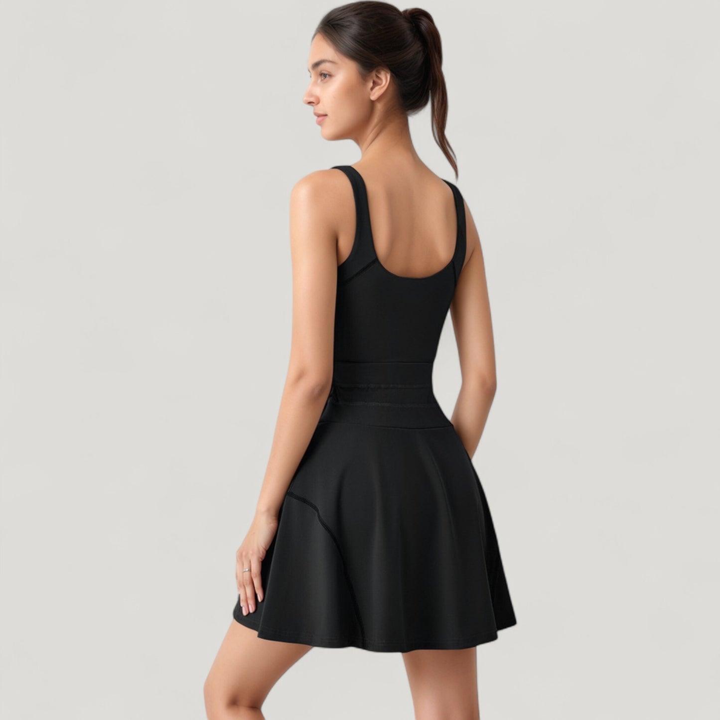 Sleeveless Tennis Dress with Scoop Neckline and Waist Tie Detail