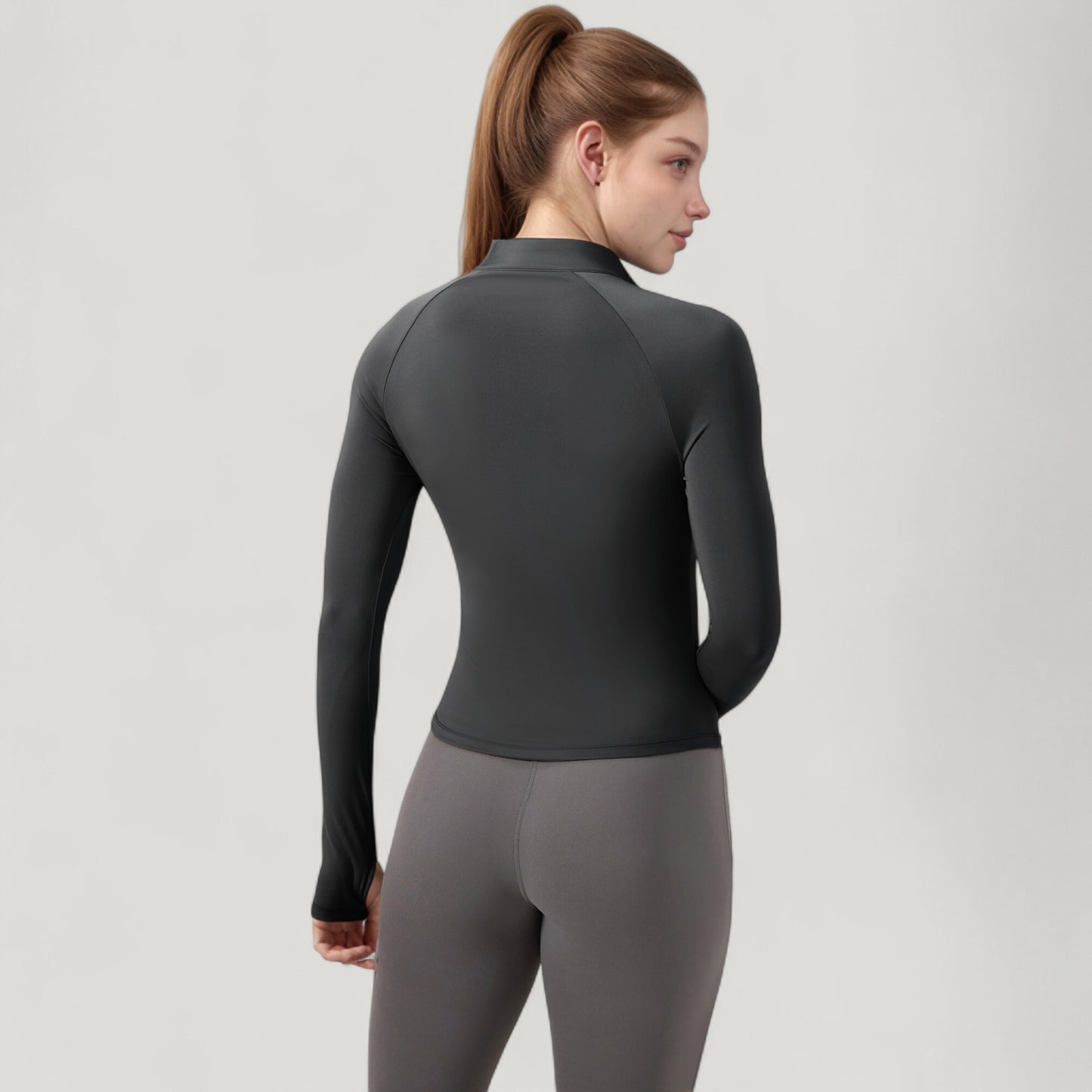 Long Sleeve Half-Zip Slim Fit Active Jacket with Thumbhole Cuffs and Mock Neck